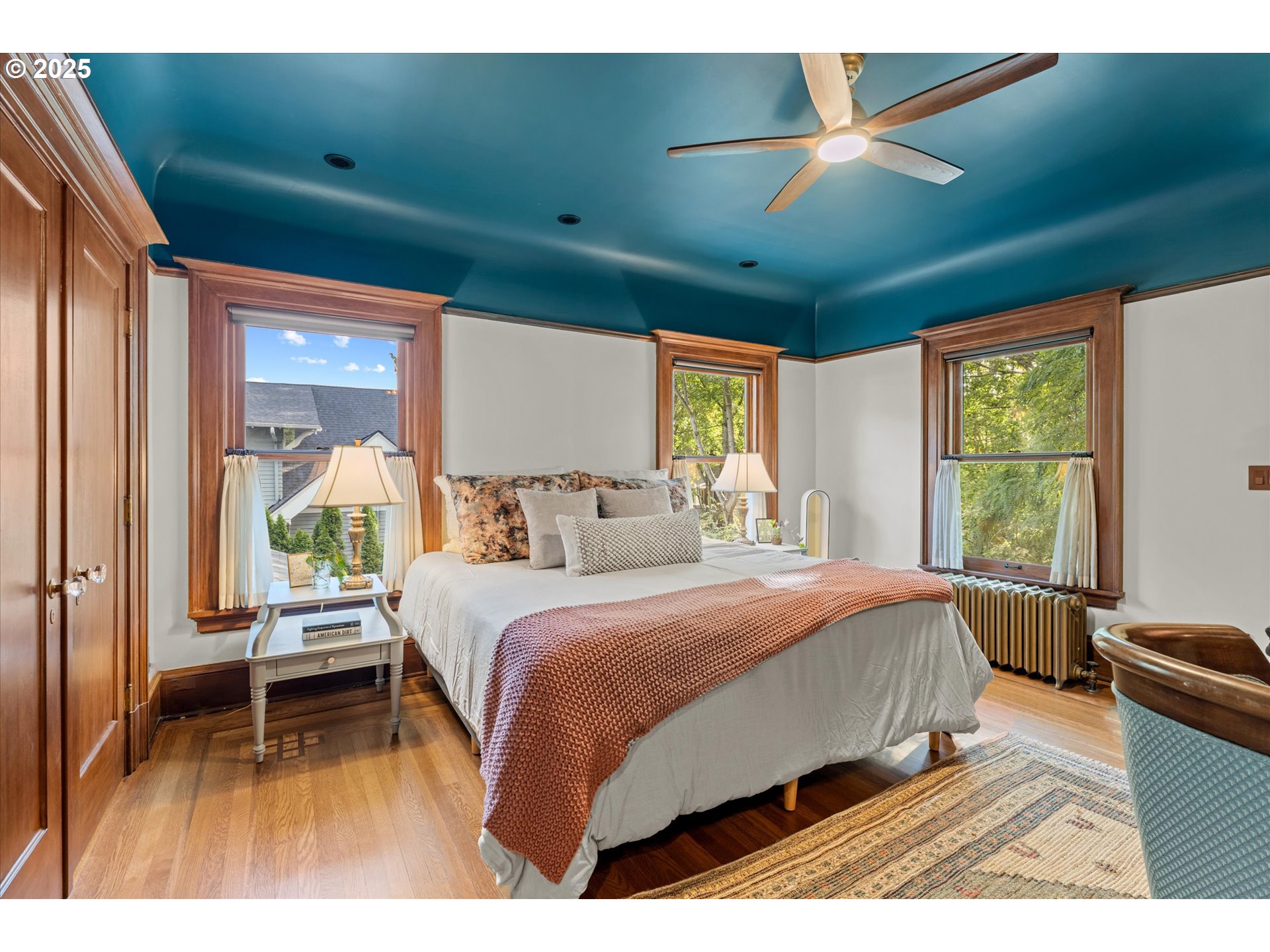 1408 Northeast Knott Street Portland, OR 97212 - Photo 23 of 48 a bedroom with a bed and a large window