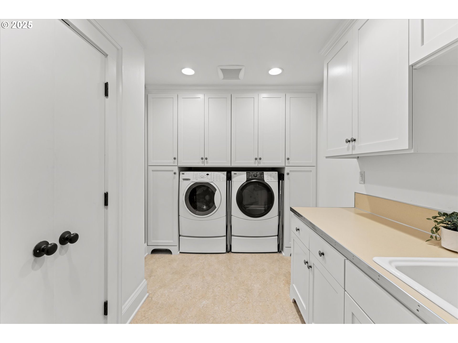 1408 Northeast Knott Street Portland, OR 97212 - Photo 34 of 48 a kitchen with a refrigerator and a sink