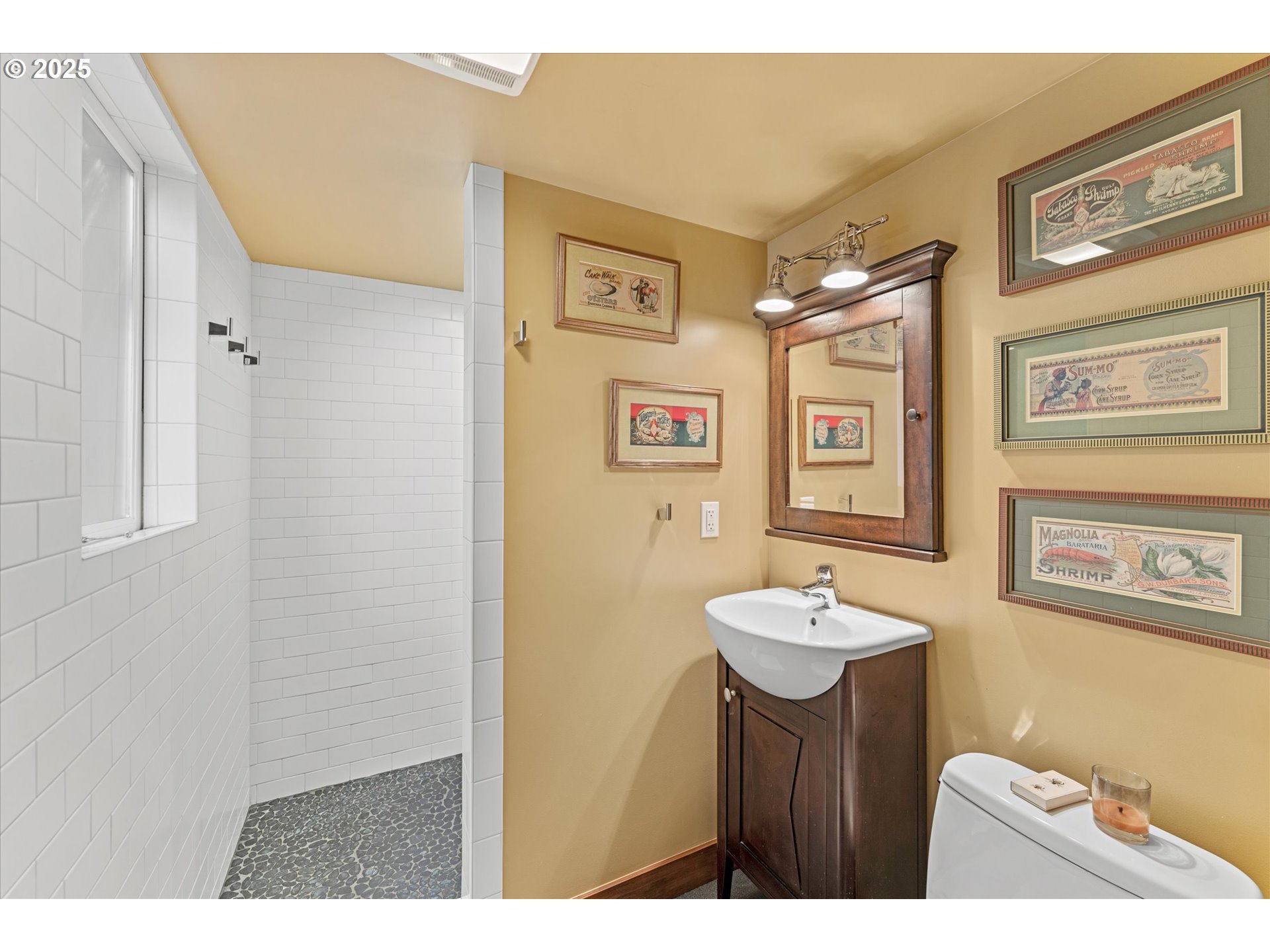 1408 Northeast Knott Street Portland, OR 97212 - Photo 44 of 48 a bathroom with a sink and a mirror