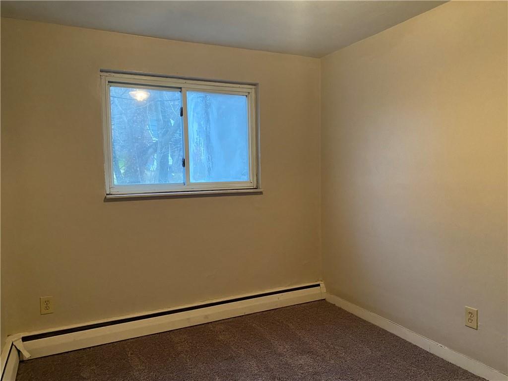 1 Penn Ridge Court, Unit 10 Pittsburgh, PA 15235 - Photo 13 of 23 an empty room with a workbench