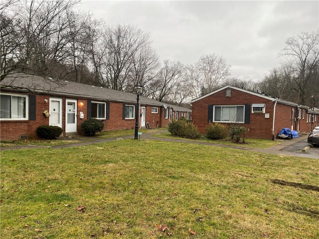 1 Penn Ridge Court, Unit 10 Pittsburgh, PA 15235 - Photo 19 of 23 a view of a house with a yard