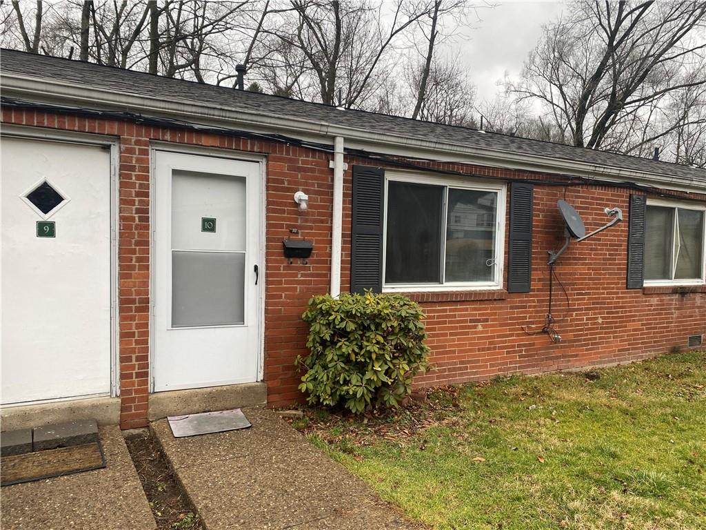 1 Penn Ridge Court, Unit 10 Pittsburgh, PA 15235 - Photo 2 of 23 a front view of a house with garden