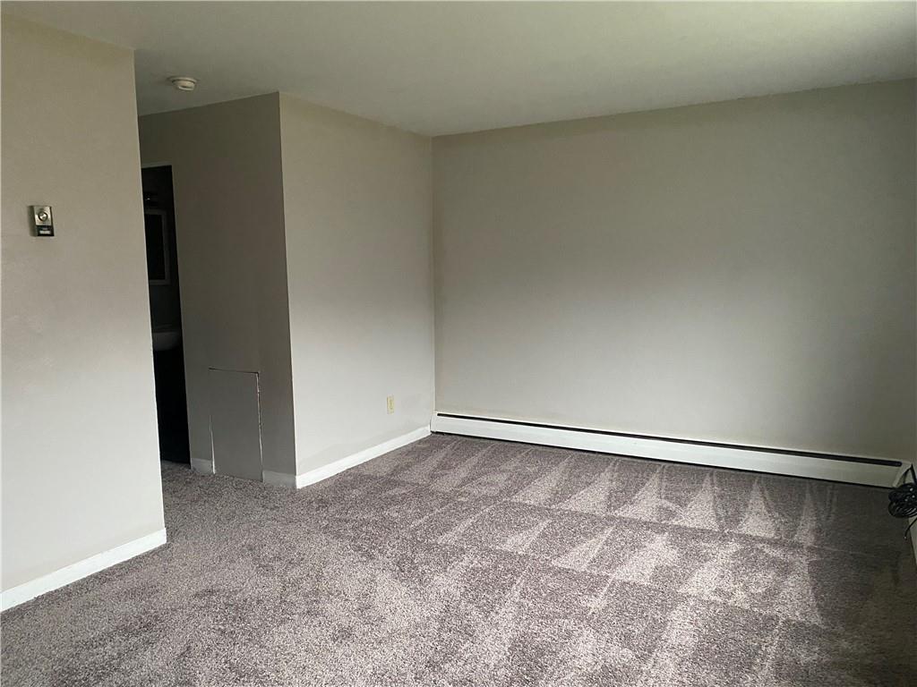 1 Penn Ridge Court, Unit 10 Pittsburgh, PA 15235 - Photo 7 of 23 an empty room with a natural light