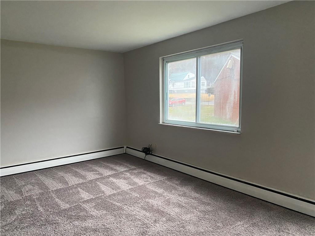 1 Penn Ridge Court, Unit 10 Pittsburgh, PA 15235 - Photo 8 of 23 an empty room with a window