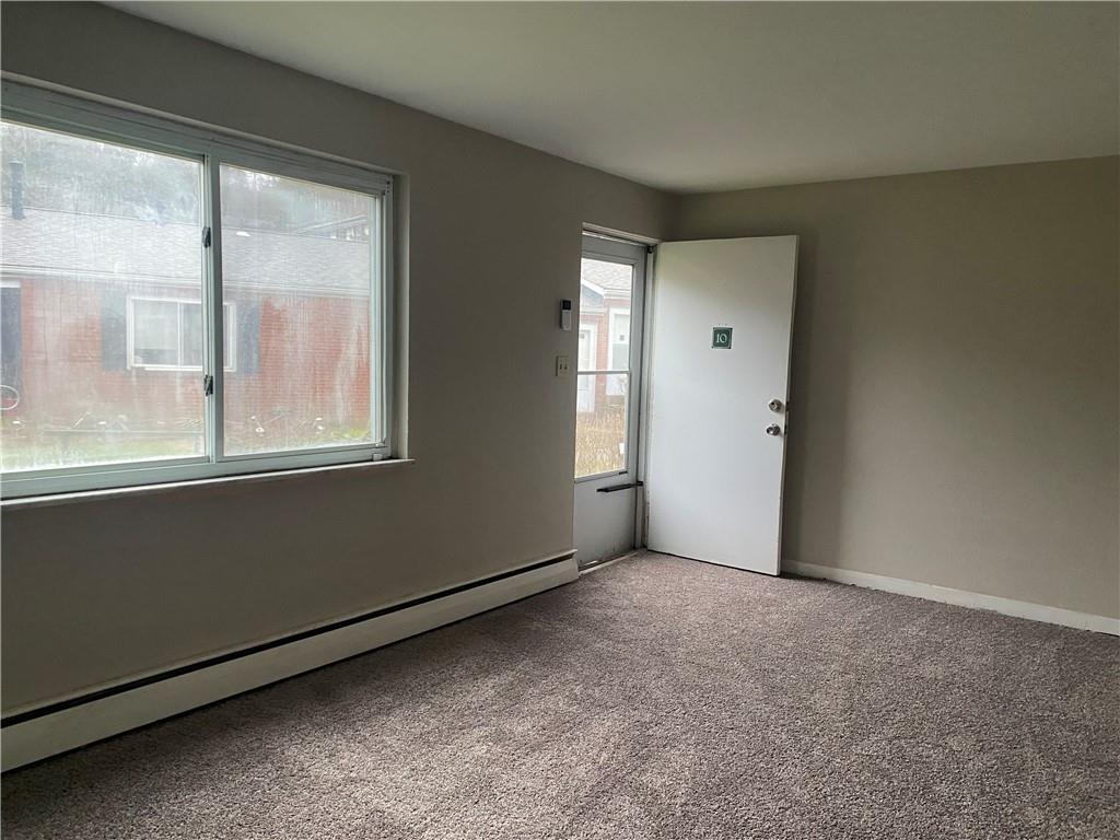 1 Penn Ridge Court, Unit 10 Pittsburgh, PA 15235 - Photo 9 of 23 an empty room with a window