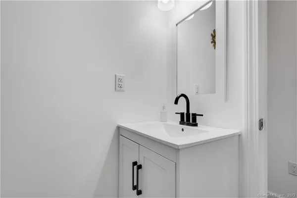 a close view of a sink and a vanity in a bathroom