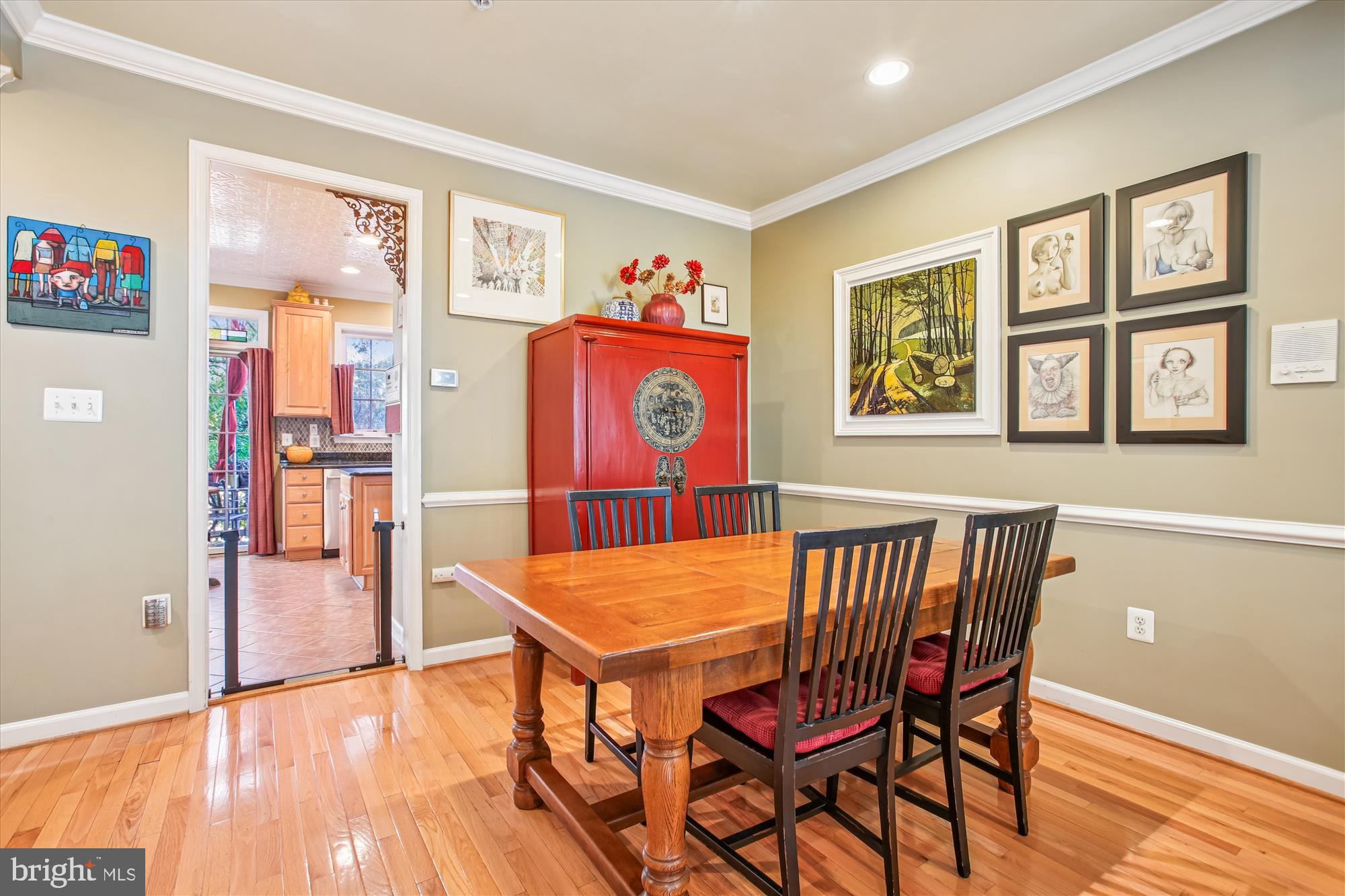 703 Capitol Square Place Southwest Washington, DC 20024 - Photo 18 of 66 a view of a dining room with furniture wooden floor and a window