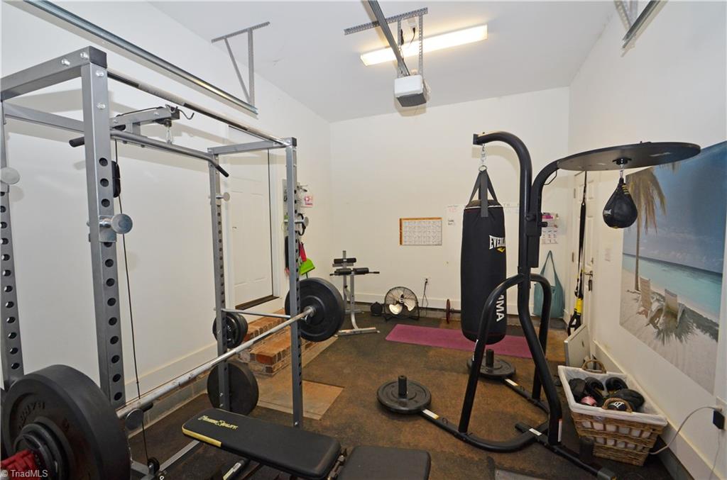 5578 Salem View Road Pfafftown, NC 27040 - Photo 33 of 48 The third garage is perfect for a home gym, workshop, or storage for lawn equipment.
