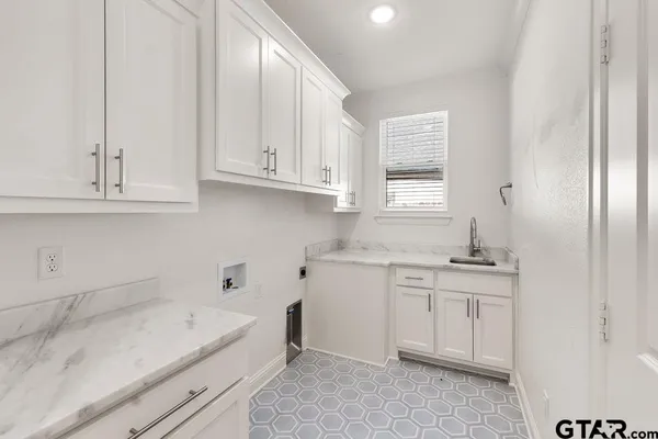 a bathroom with a bathtub and a toilet