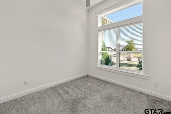 a white bath tub sitting in a bathroom