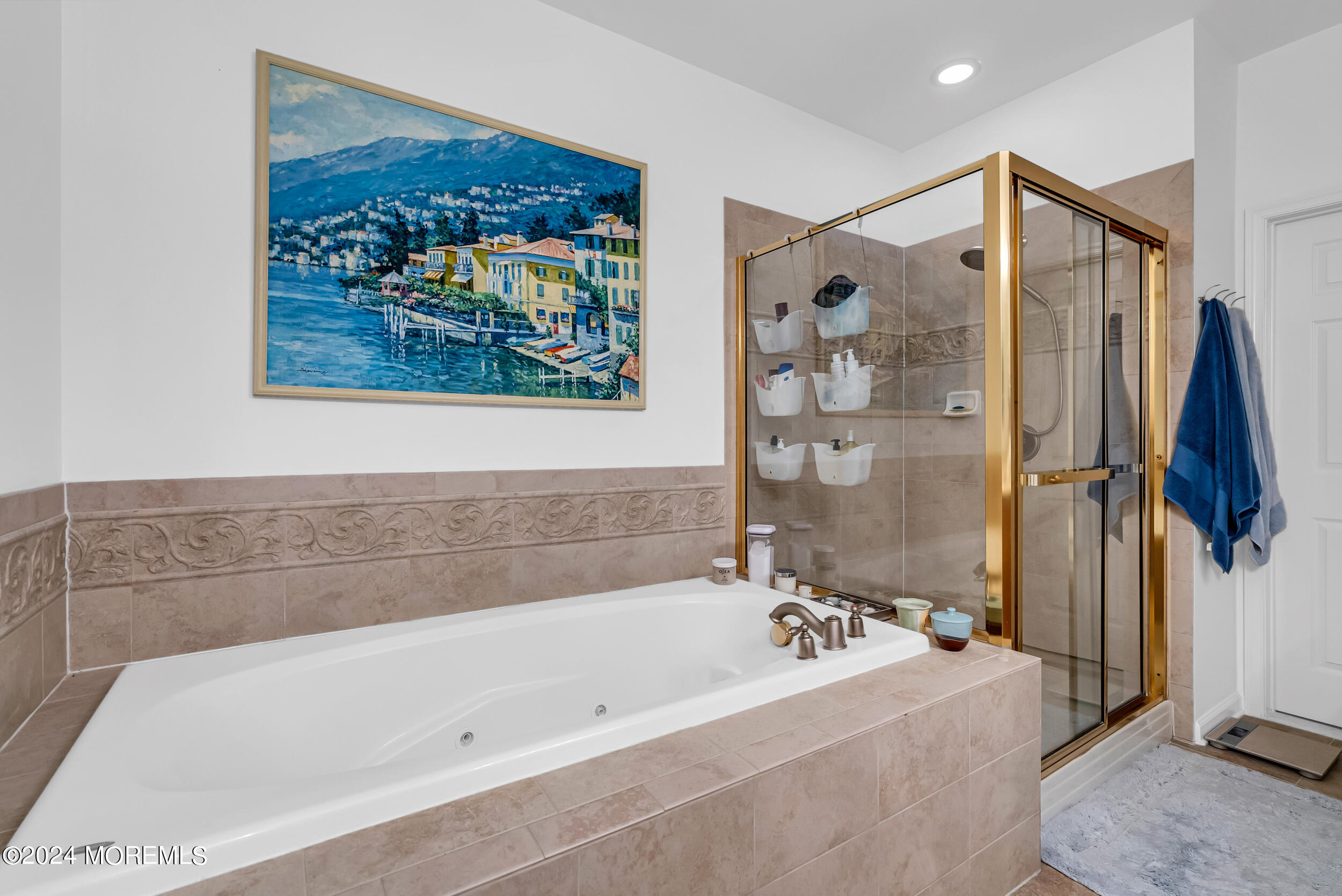 33 Cooper Avenue, Unit 215 Long Branch, NJ 07740 - Photo 22 of 27 a bathroom with a bathtub and a shower