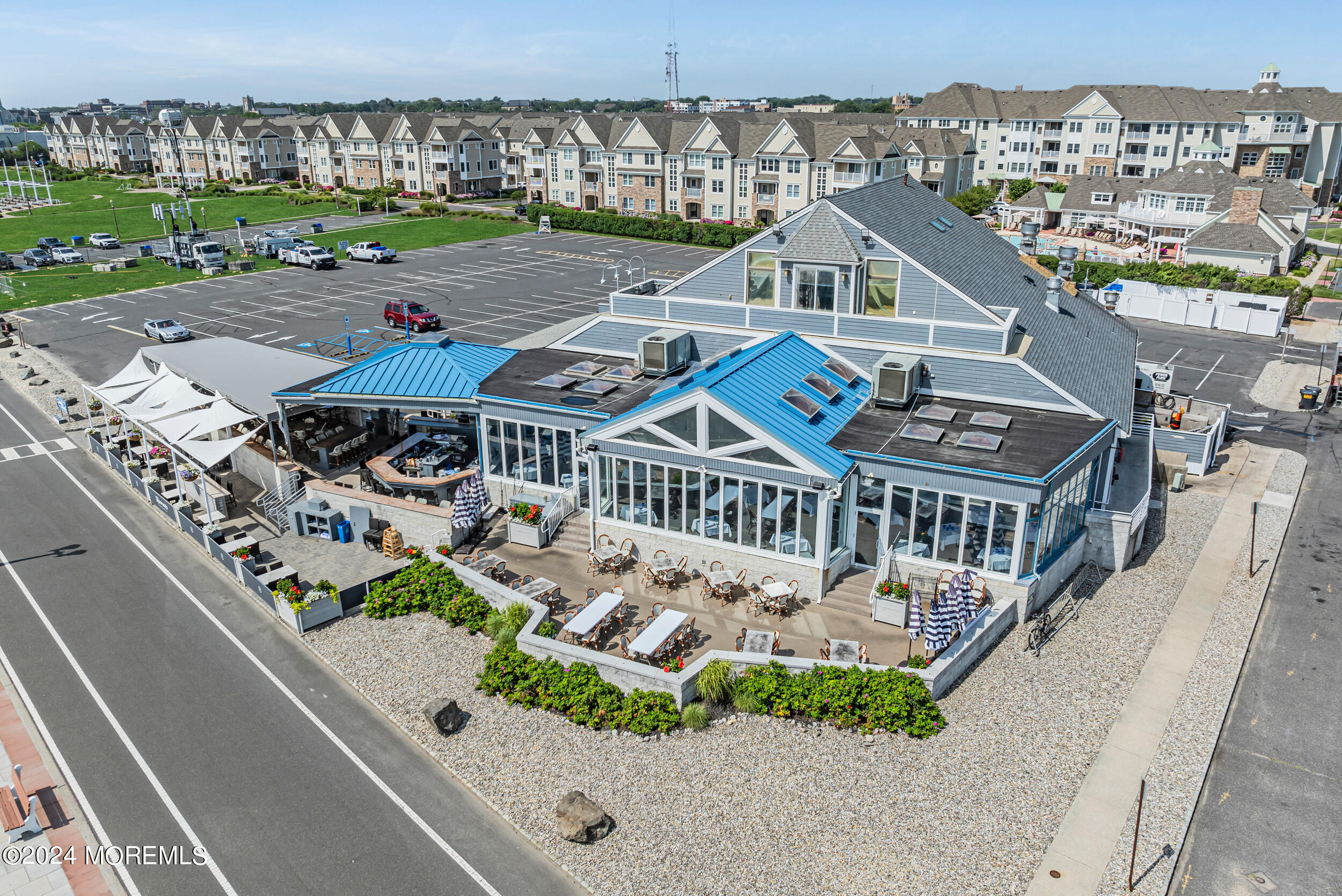 33 Cooper Avenue, Unit 215 Long Branch, NJ 07740 - Photo 7 of 27 an aerial view of a house with a garden