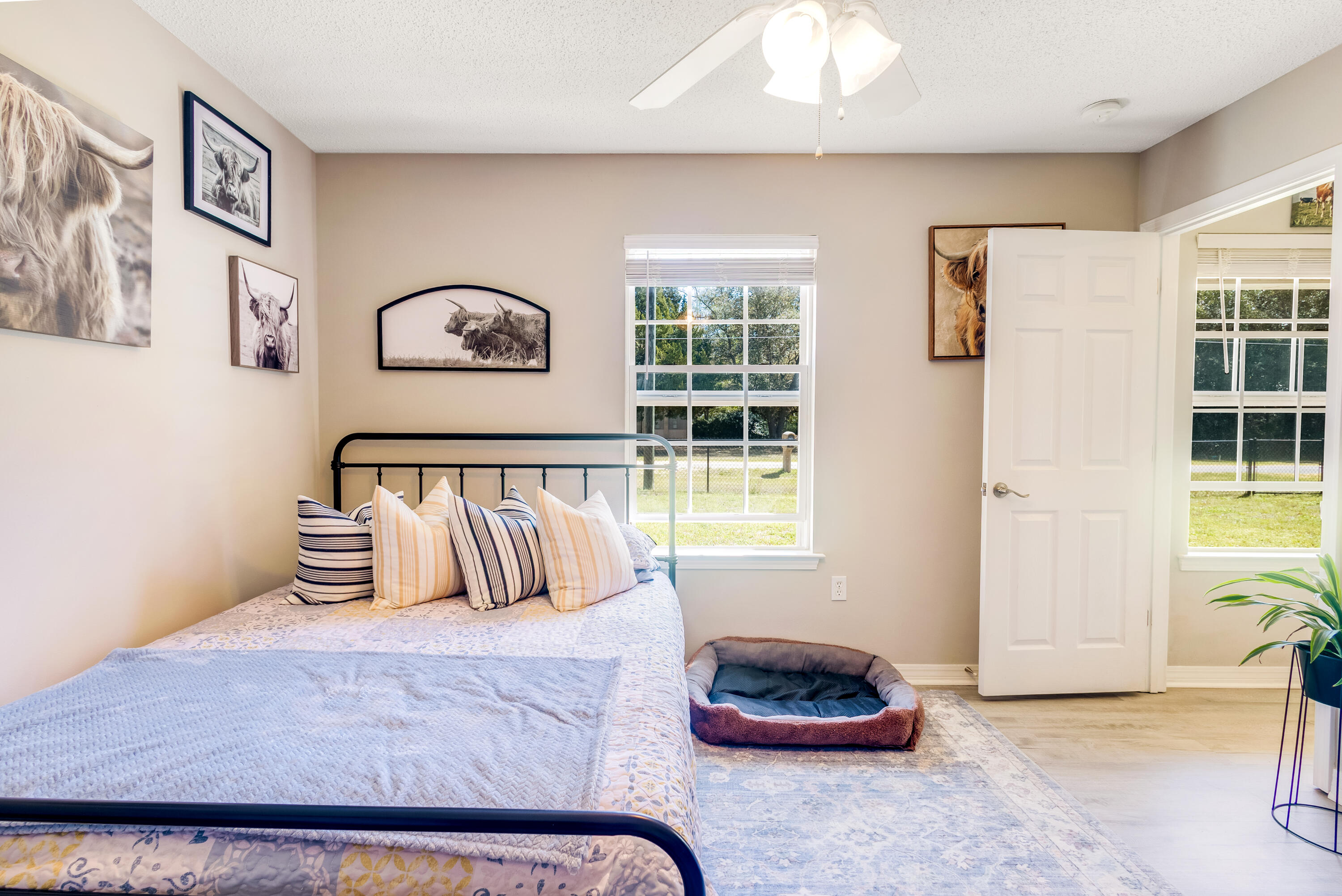 103 Valley View Drive DeFuniak Springs, FL 32433 - Photo 19 of 34 a bedroom with a bed and a window