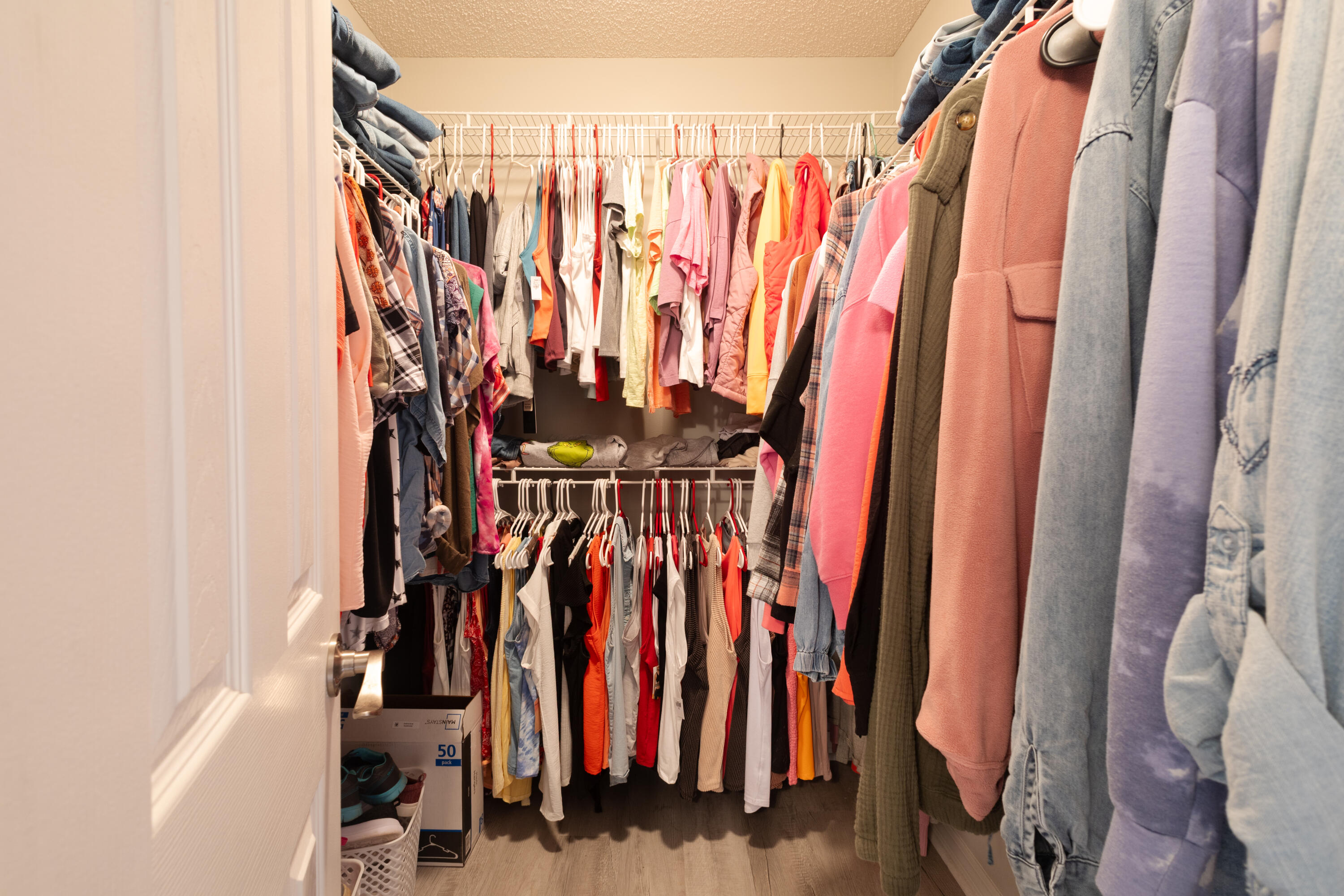 103 Valley View Drive DeFuniak Springs, FL 32433 - Photo 21 of 34 a view of walk in closet with clothes