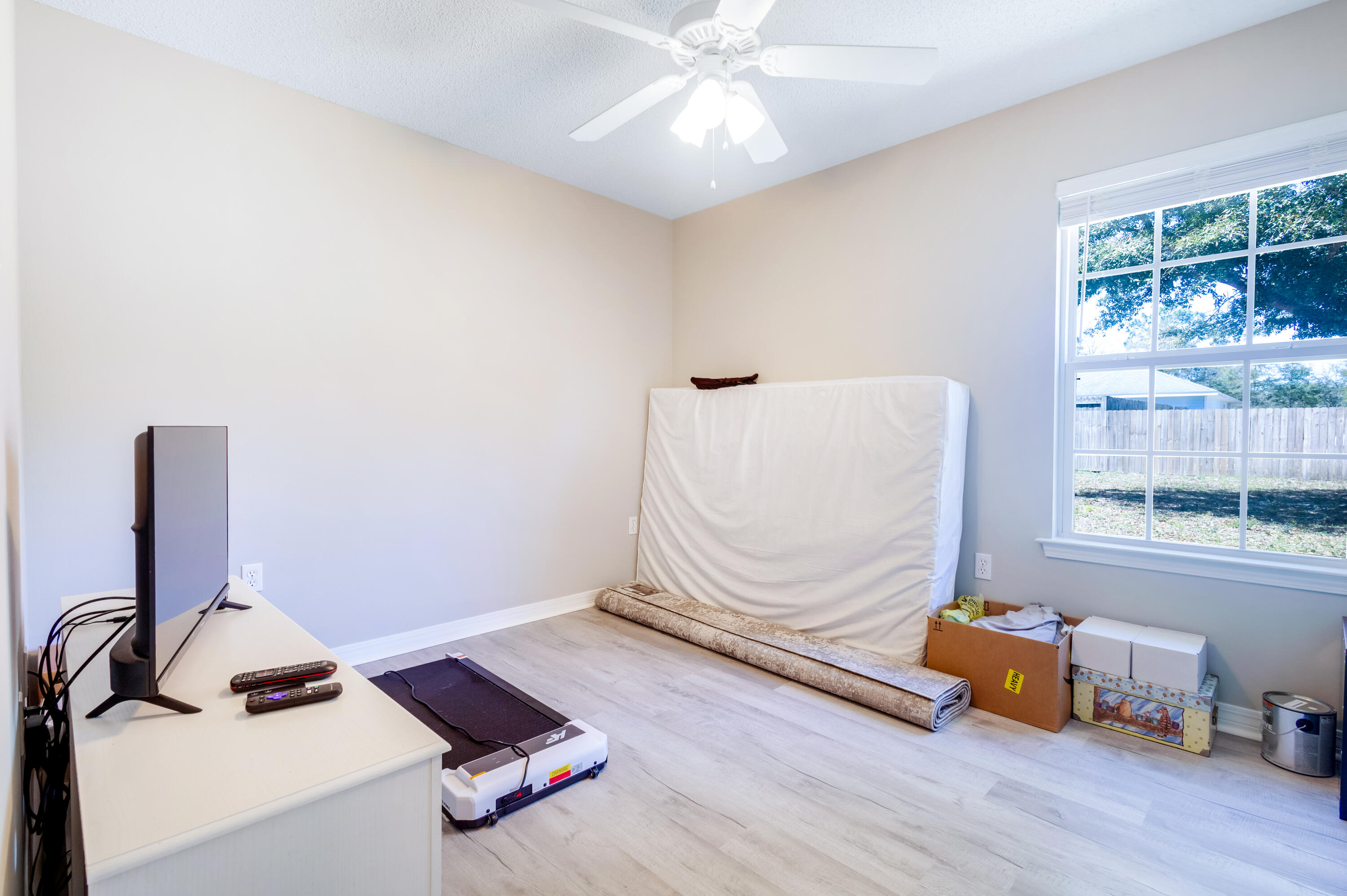 103 Valley View Drive DeFuniak Springs, FL 32433 - Photo 26 of 34 a room with toys and a wooden floor