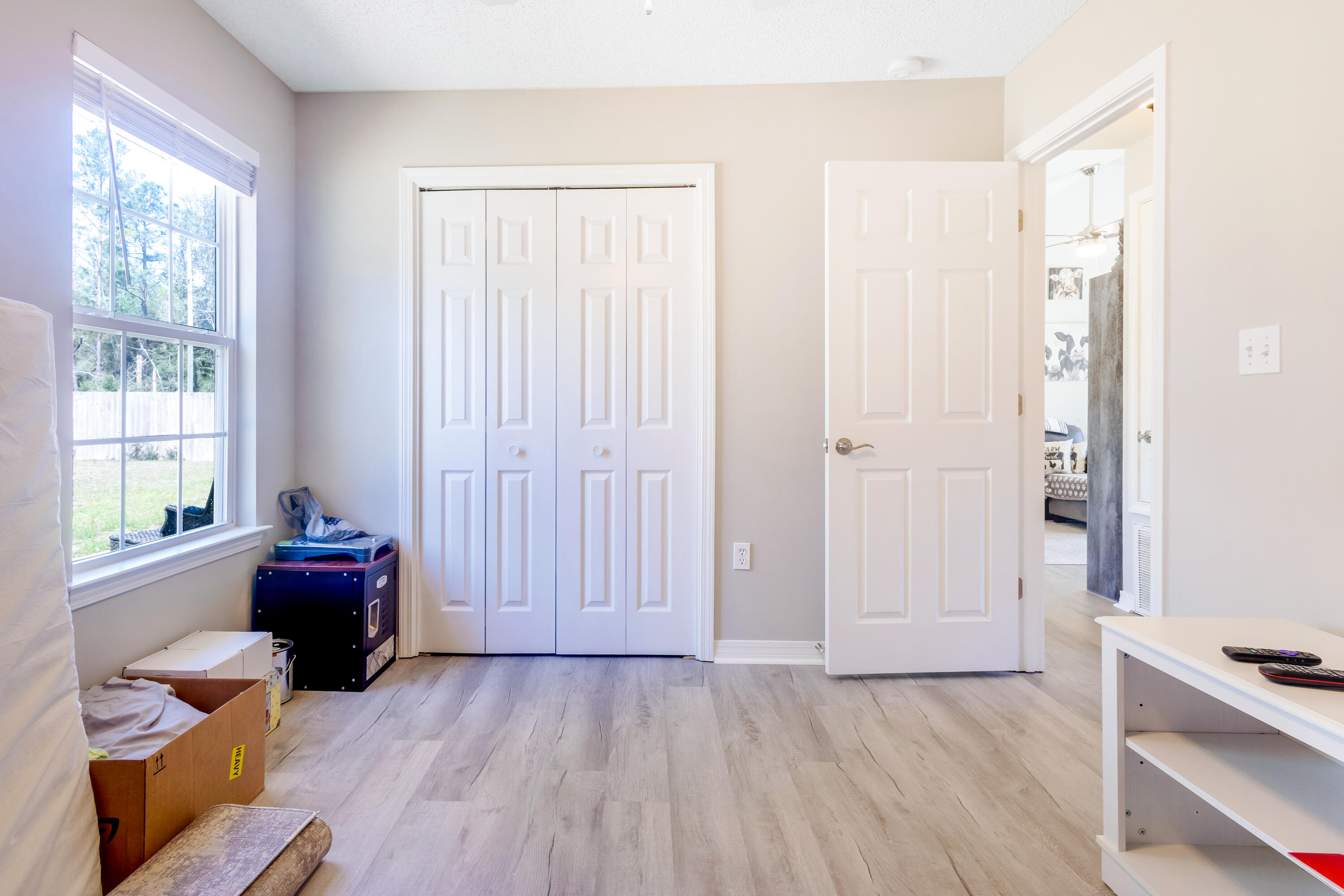103 Valley View Drive DeFuniak Springs, FL 32433 - Photo 27 of 34 a living room with furniture and wooden floor