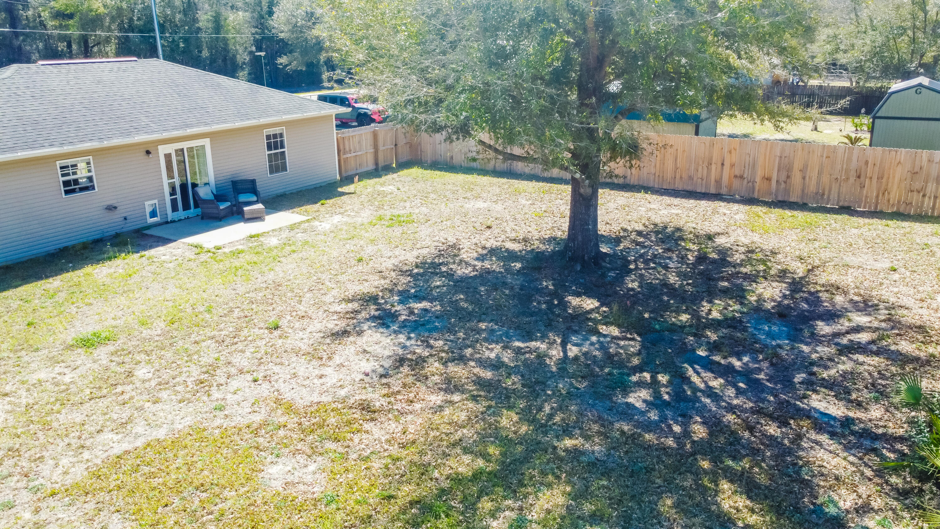 103 Valley View Drive DeFuniak Springs, FL 32433 - Photo 31 of 34 a view of a house with a yard
