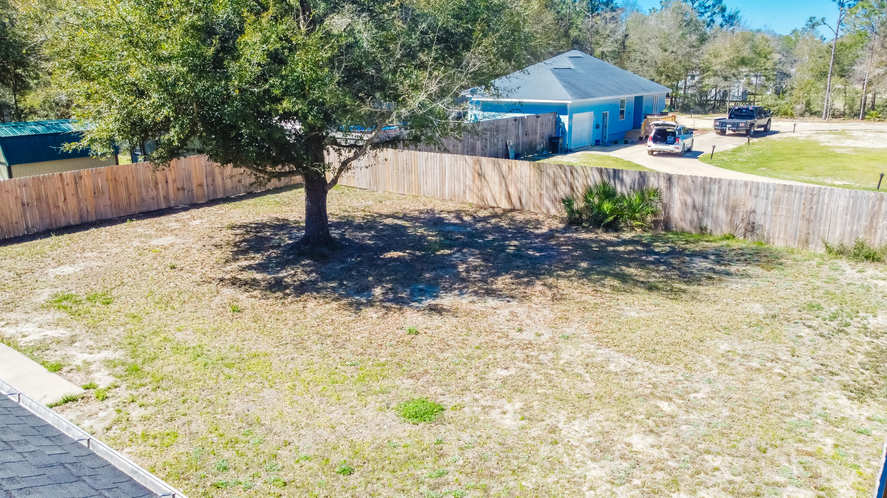 103 Valley View Drive DeFuniak Springs, FL 32433 - Photo 6 of 34 a front view of a house with garden