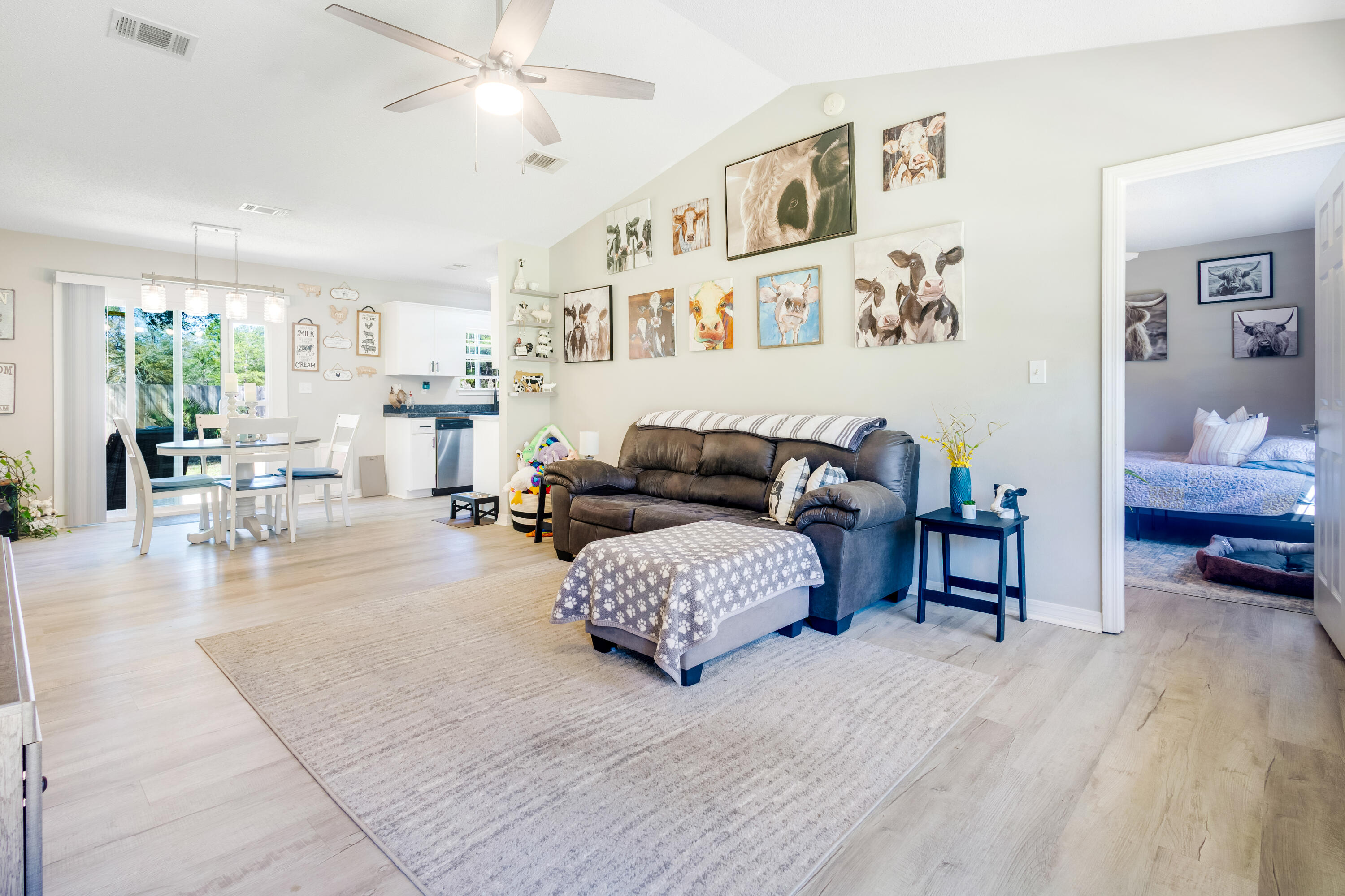 103 Valley View Drive DeFuniak Springs, FL 32433 - Photo 7 of 34 a living room with furniture and a large window