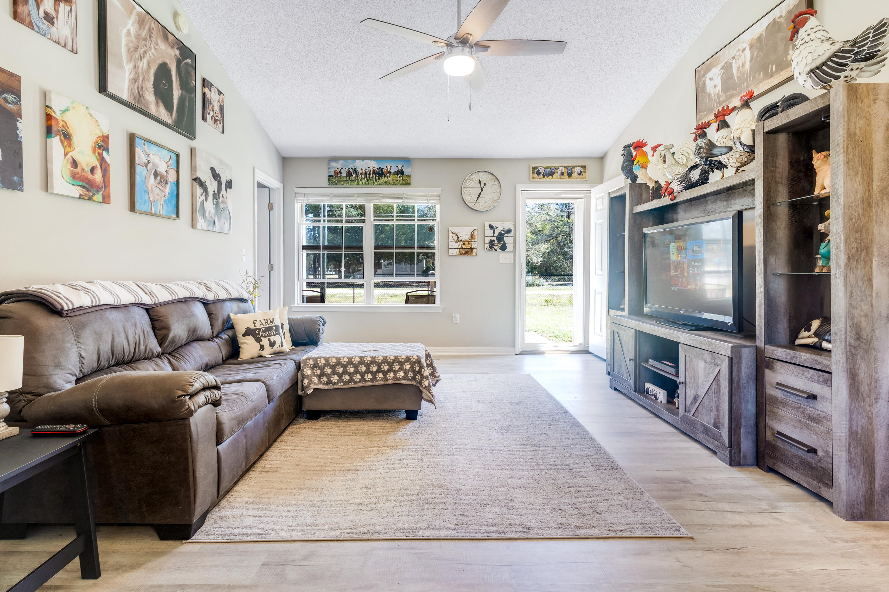103 Valley View Drive DeFuniak Springs, FL 32433 - Photo 8 of 34 a living room with furniture and a flat screen tv