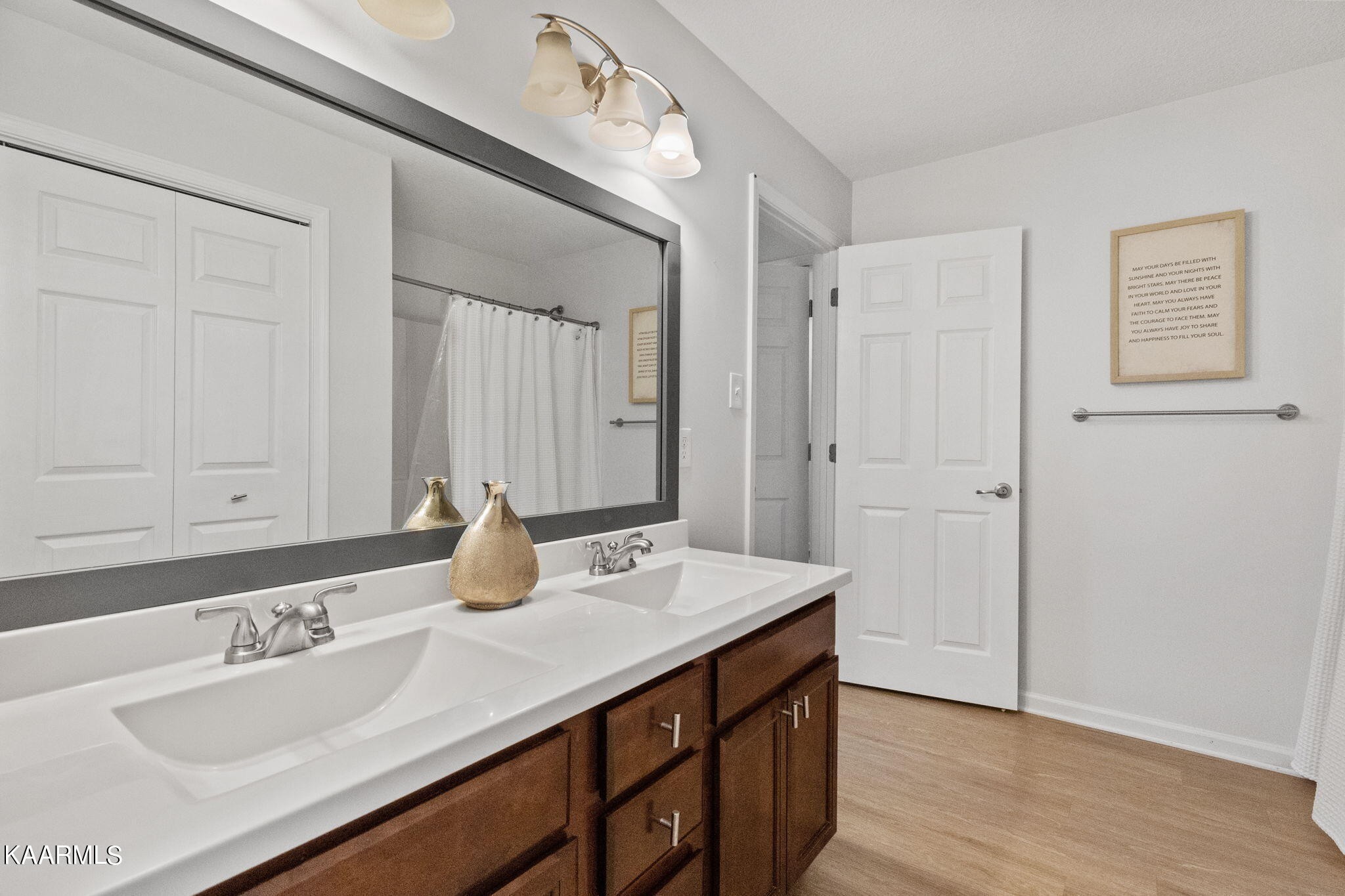 1825 Turning Point Road Powell, TN 37849 - Photo 25 of 40 a bathroom with a sink double vanity and a mirror