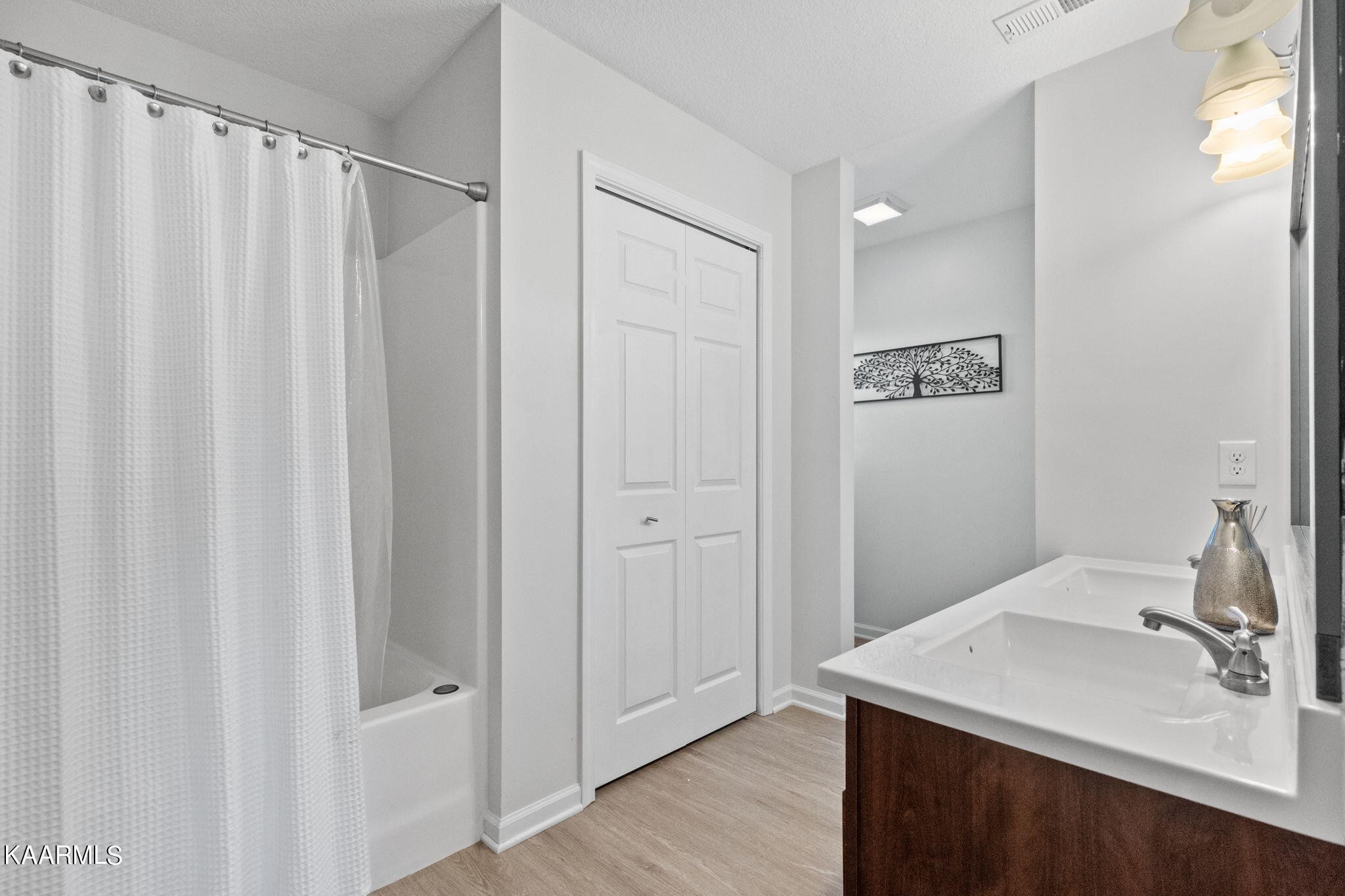 1825 Turning Point Road Powell, TN 37849 - Photo 26 of 40 a bathroom with a sink and a mirror