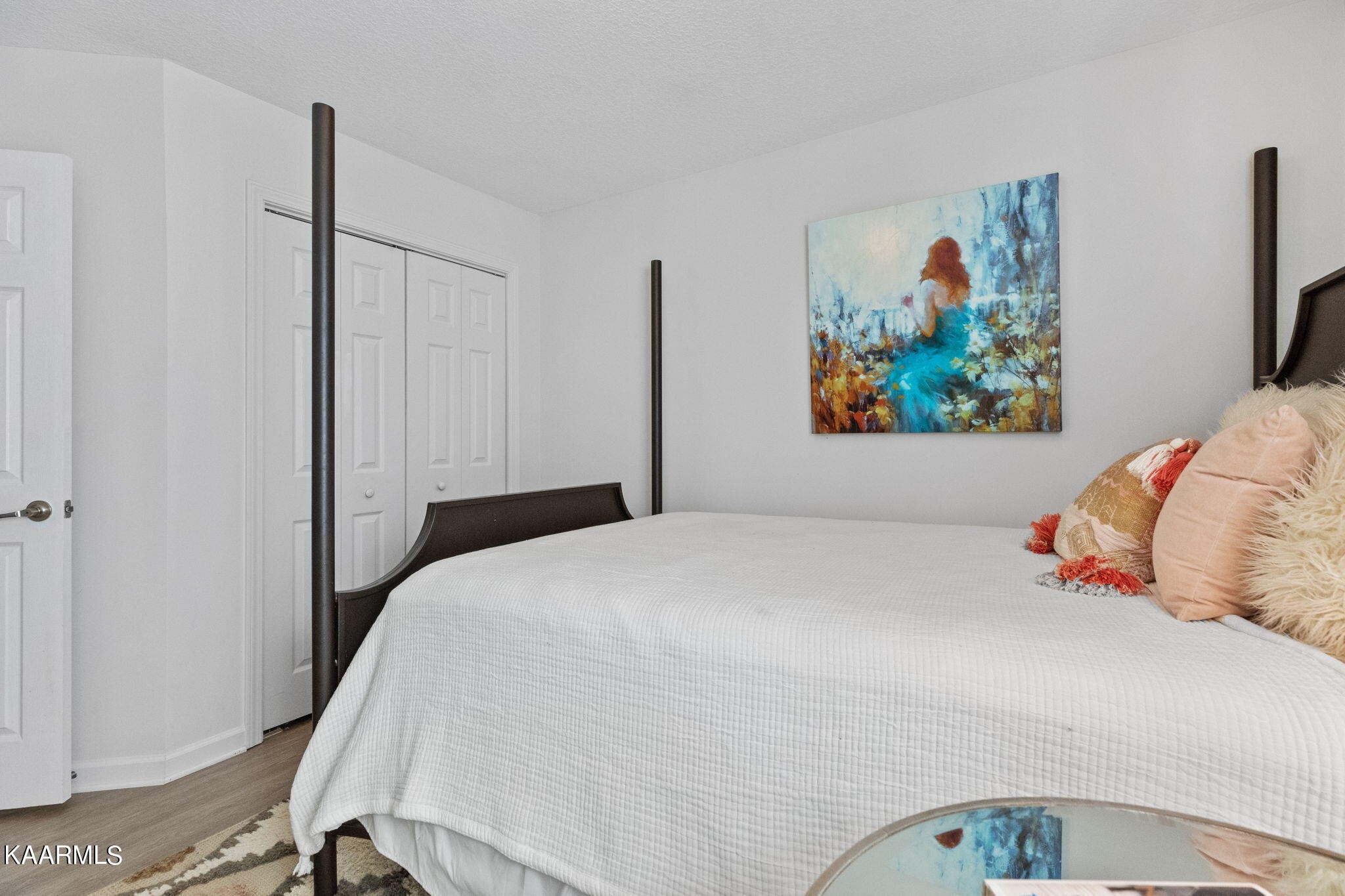 1825 Turning Point Road Powell, TN 37849 - Photo 29 of 40 a bedroom with a bed and painting on the wall