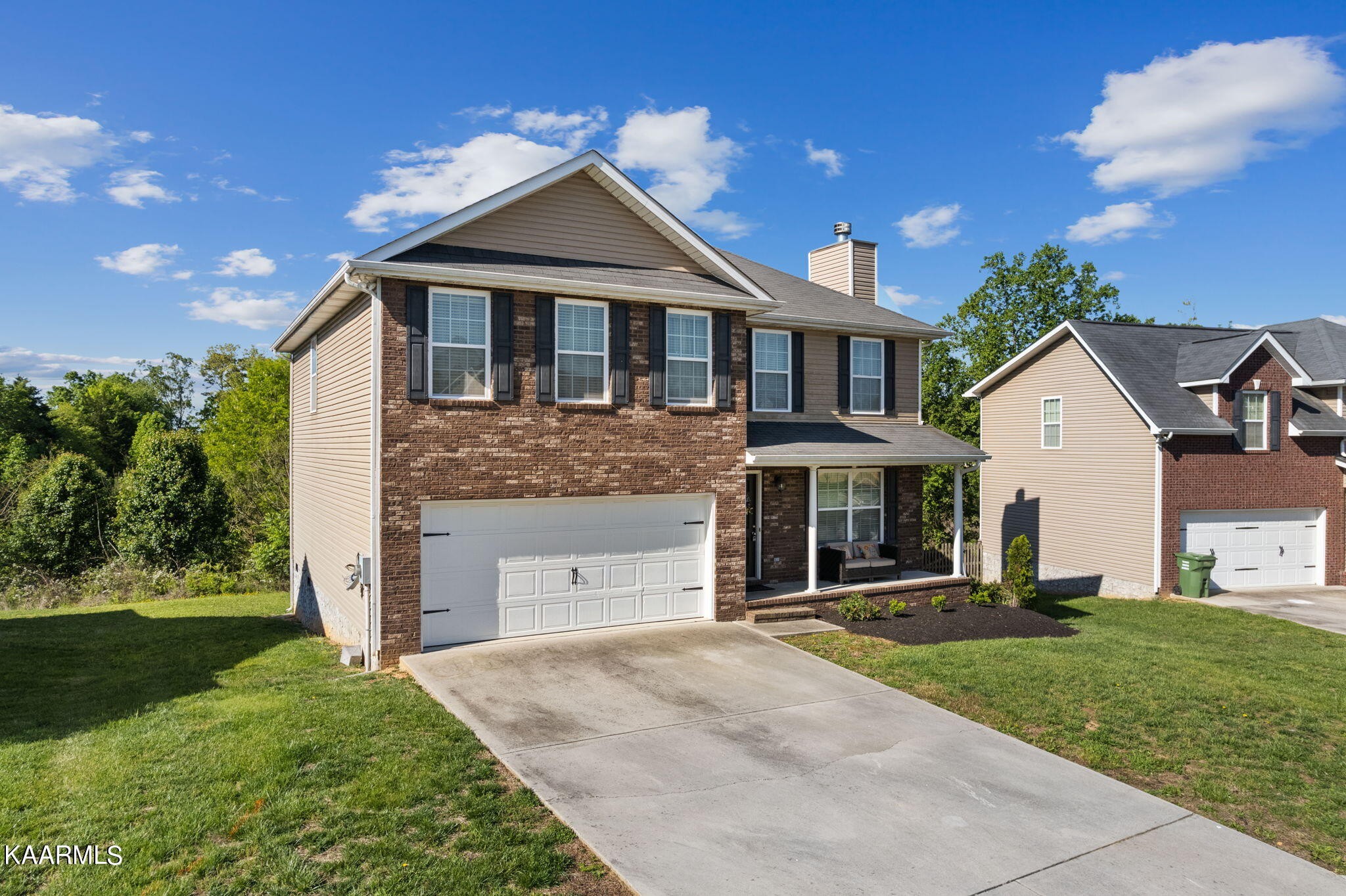 1825 Turning Point Road Powell, TN 37849 - Photo 3 of 40 a front view of a house with a yard