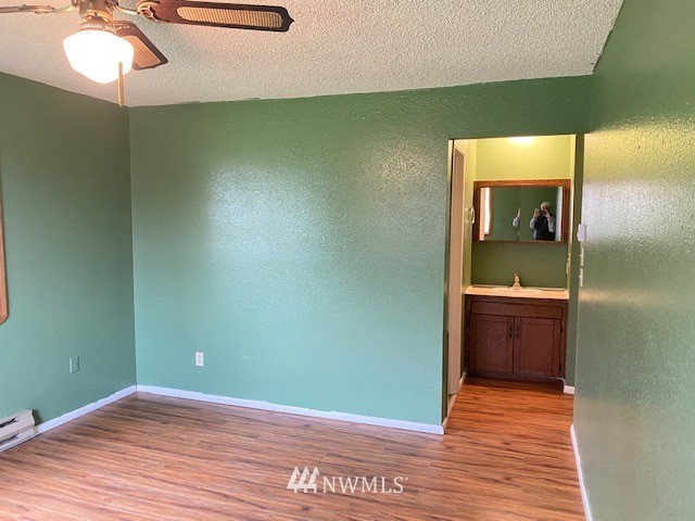 1869 Bishop Road Chehalis, WA 98532 - Photo 13 of 25 a view of a hallway with a washer and dryer