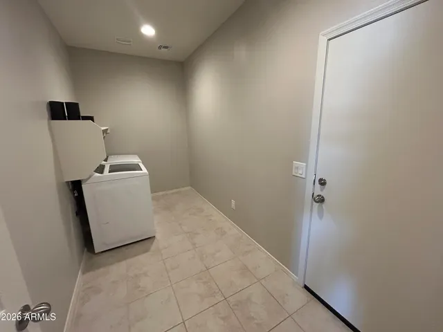 a room with a sink and a vanity