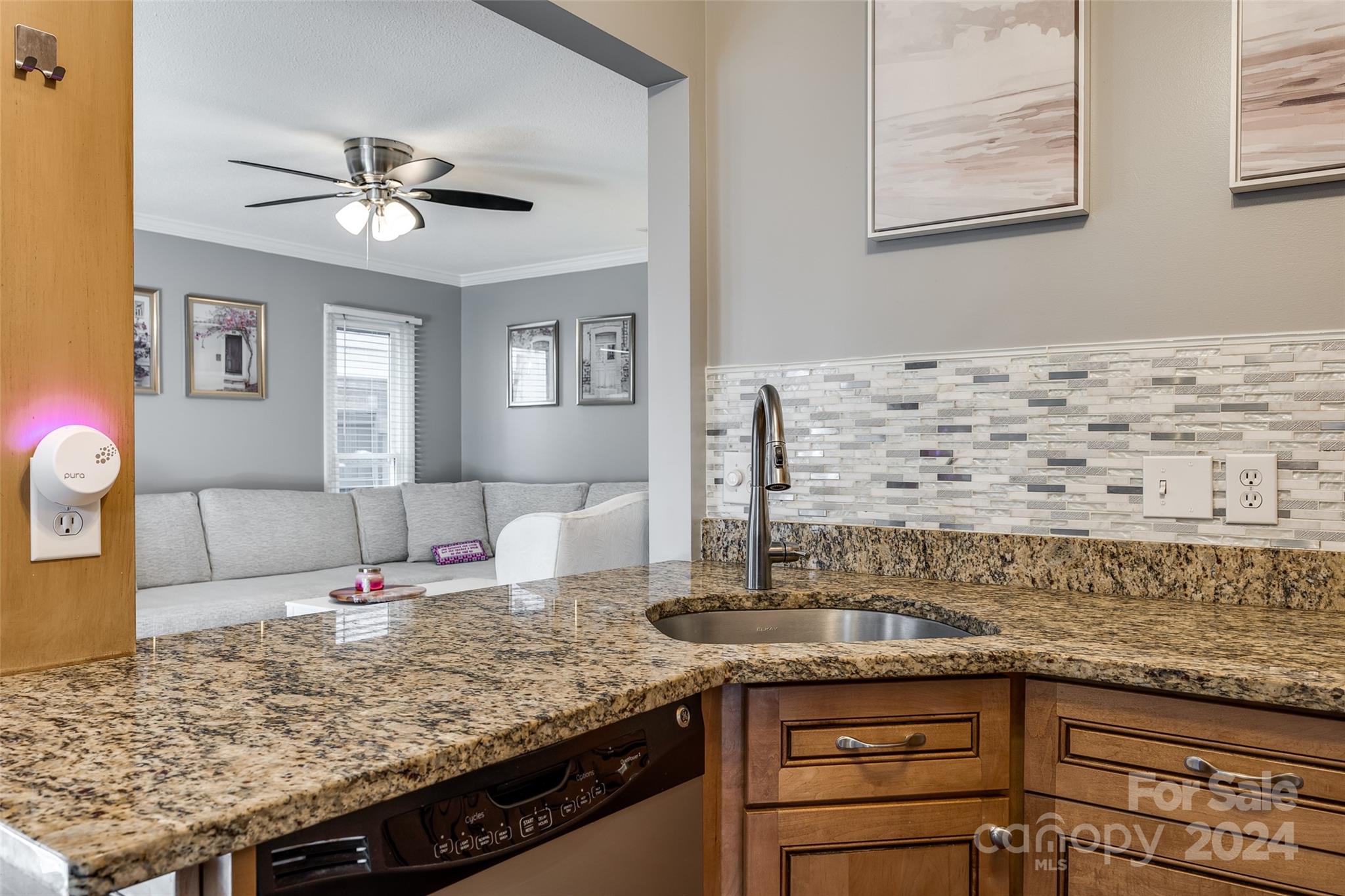 414 West 9th Street, Unit F Charlotte, NC 28202 - Photo 13 of 31 a living room with granite countertop furniture and fireplace