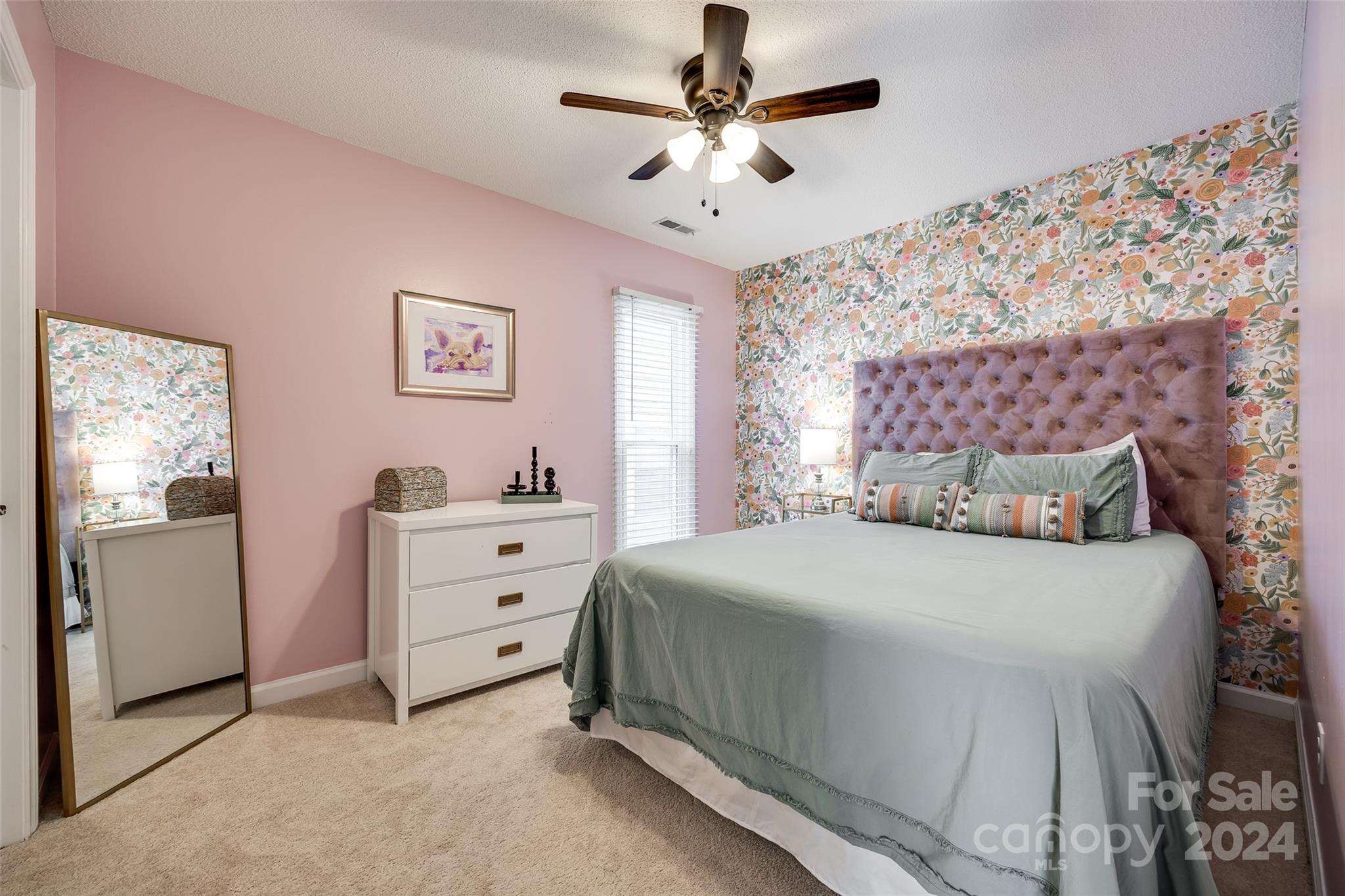 414 West 9th Street, Unit F Charlotte, NC 28202 - Photo 18 of 31 a bedroom with a bed and a window