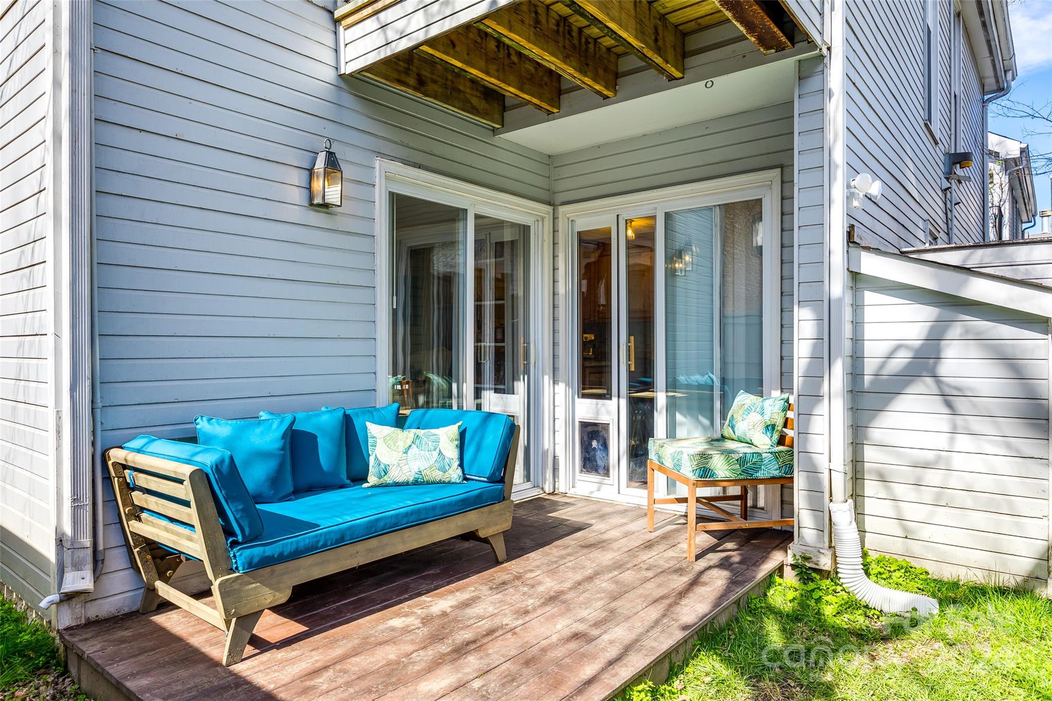 414 West 9th Street, Unit F Charlotte, NC 28202 - Photo 26 of 31 a outdoor living space with furniture and a potted plant