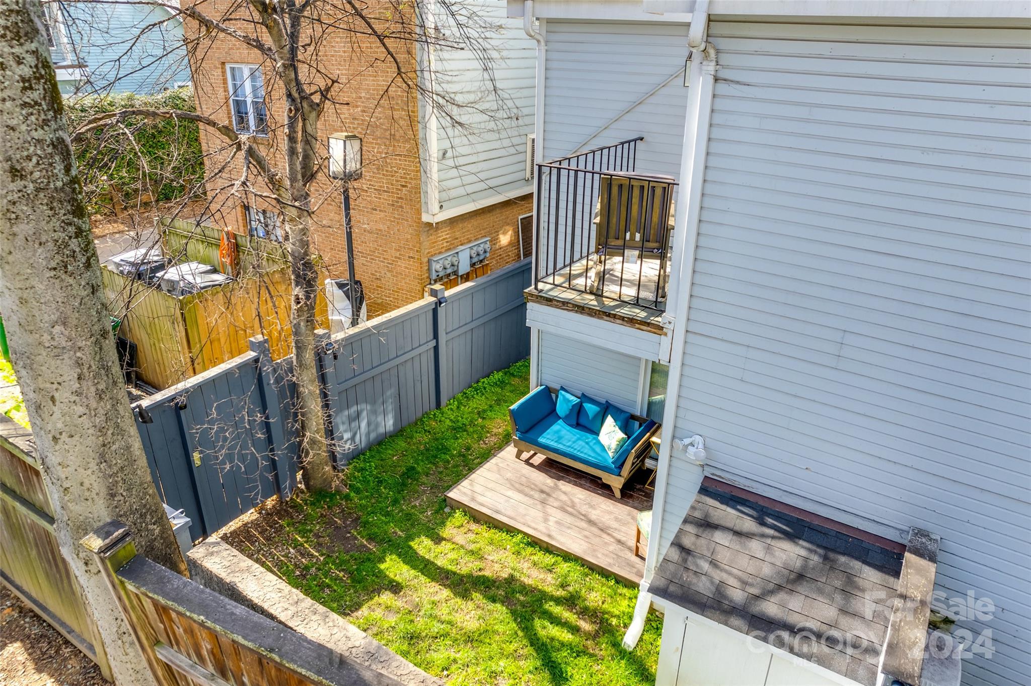 414 West 9th Street, Unit F Charlotte, NC 28202 - Photo 29 of 31 a view of house with backyard