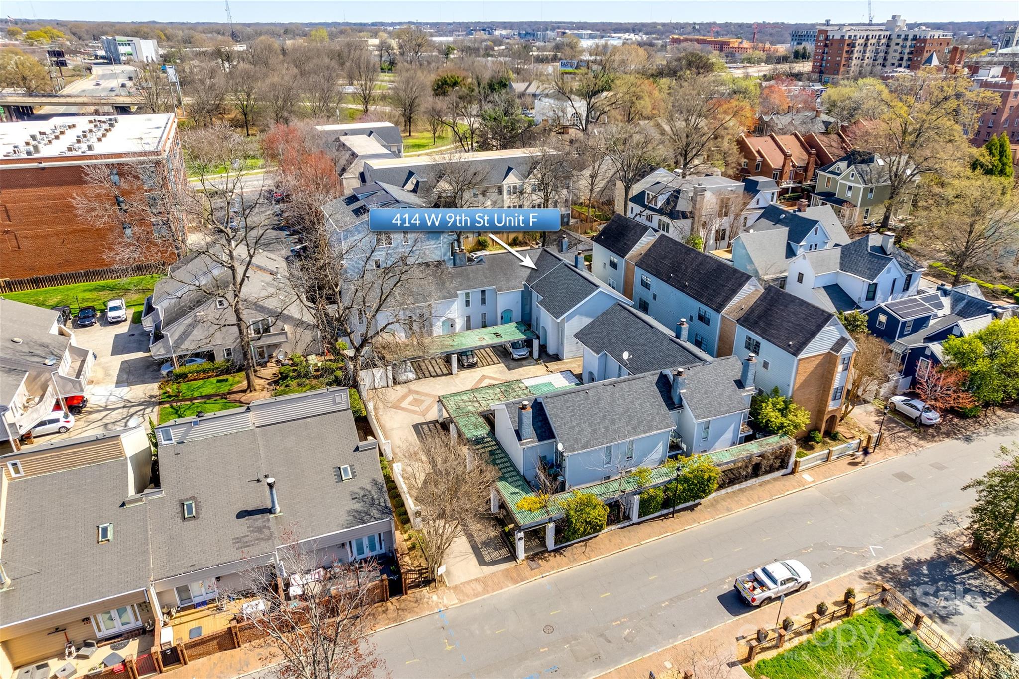 414 West 9th Street, Unit F Charlotte, NC 28202 - Photo 30 of 31 an aerial view of a city with lots of residential buildings
