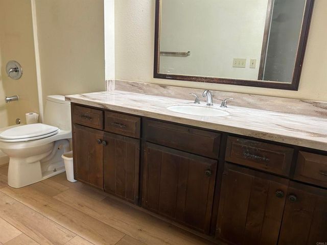 a bathroom with a sink and a toilet