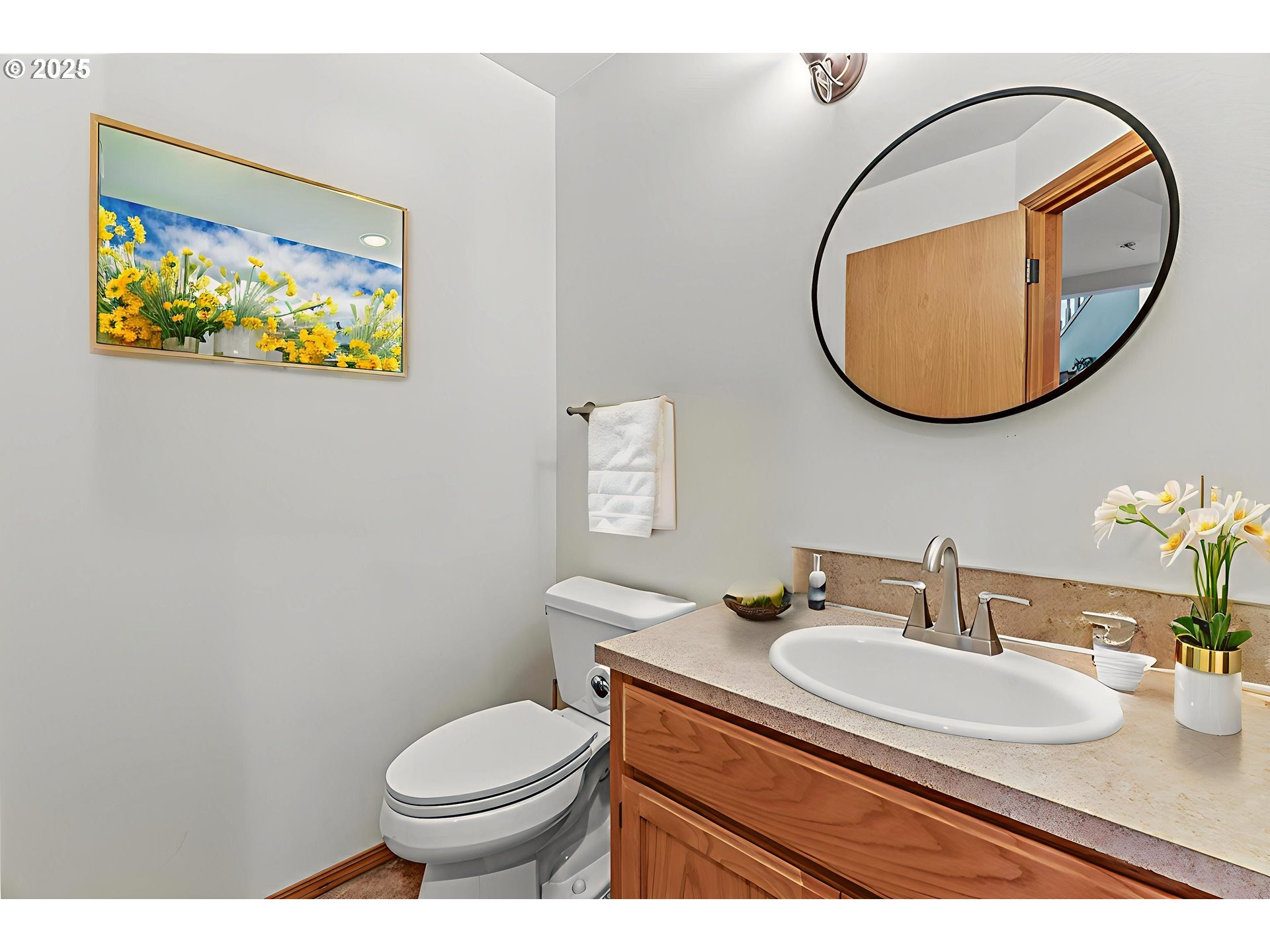32898 Southwest Keys Landing Way Scappoose, OR 97056 - Photo 12 of 29 a bathroom with a toilet a sink and a mirror