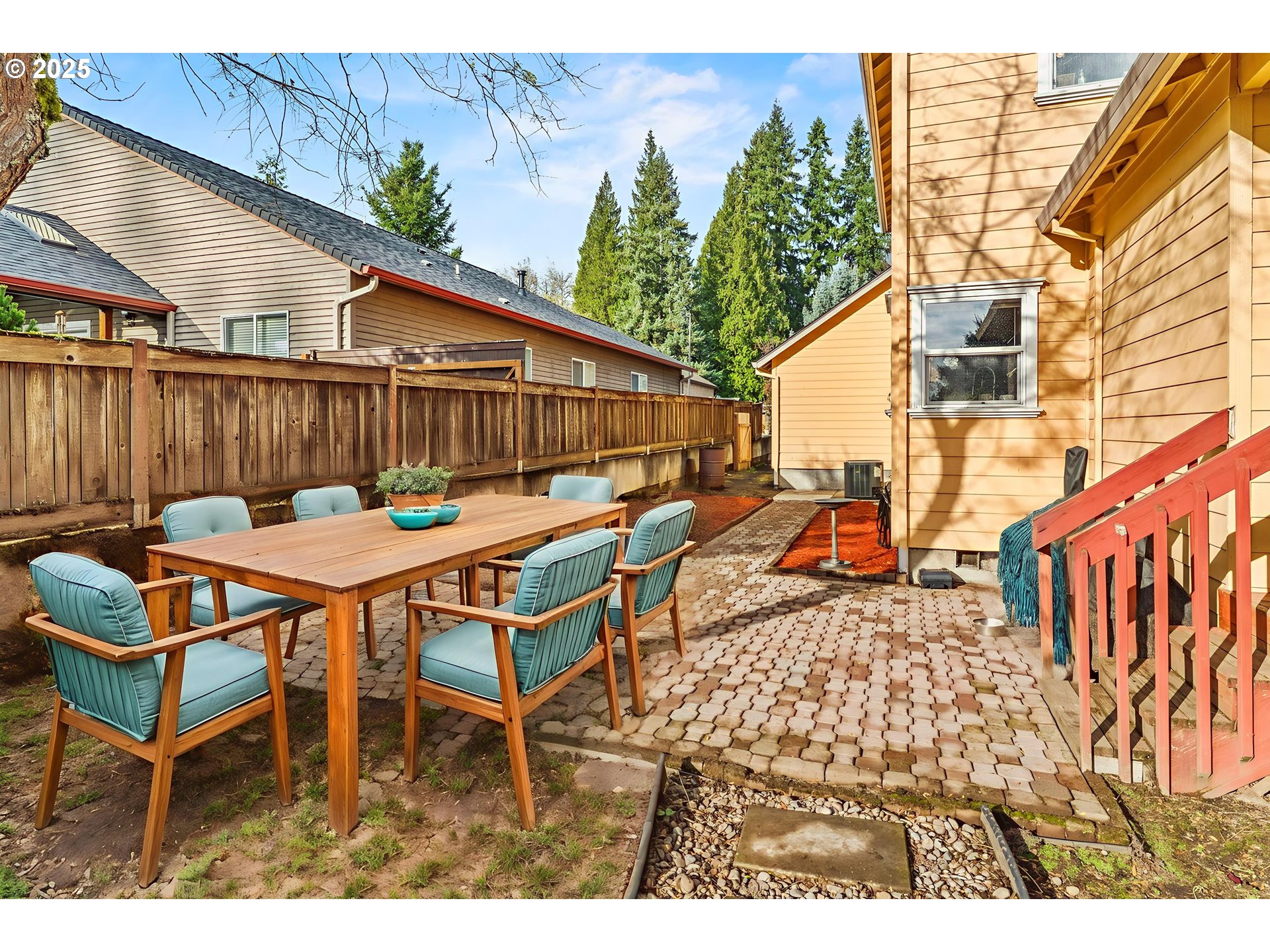32898 Southwest Keys Landing Way Scappoose, OR 97056 - Photo 19 of 29 a backyard of a house with table and chairs