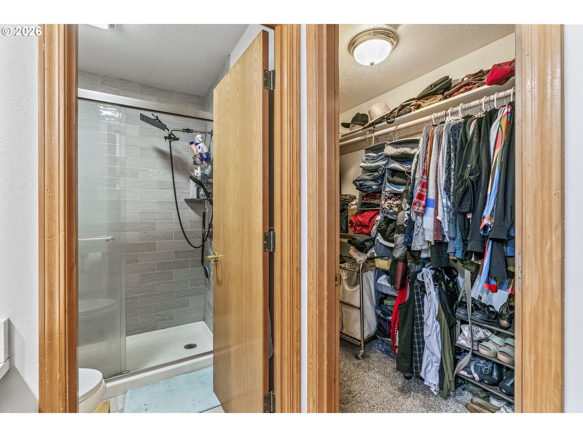 32898 Southwest Keys Landing Way Scappoose, OR 97056 - Photo 30 of 39 a view of walk in closet with clothes