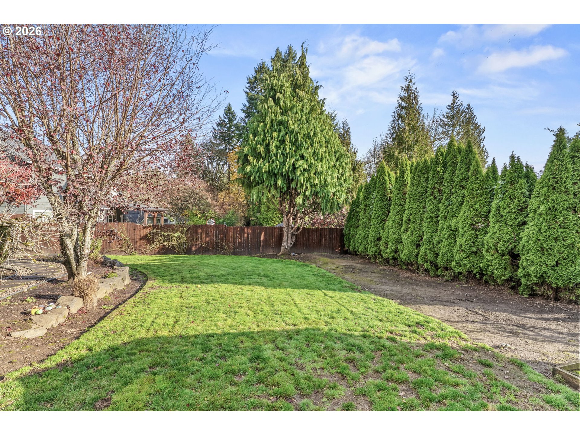 32898 Southwest Keys Landing Way Scappoose, OR 97056 - Photo 33 of 39 a view of a yard with a tree