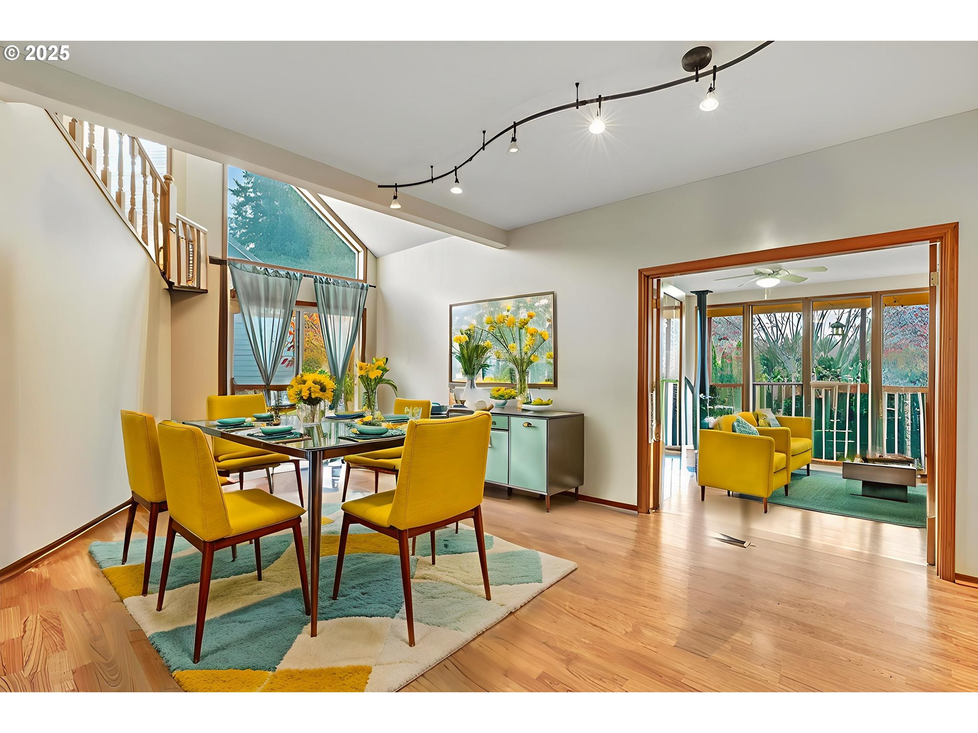 32898 Southwest Keys Landing Way Scappoose, OR 97056 - Photo 9 of 29 a view of a dining room with furniture and wooden floor