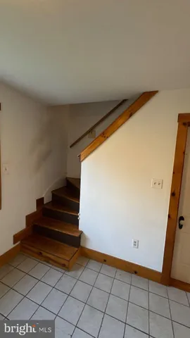 a view of entryway with stairs