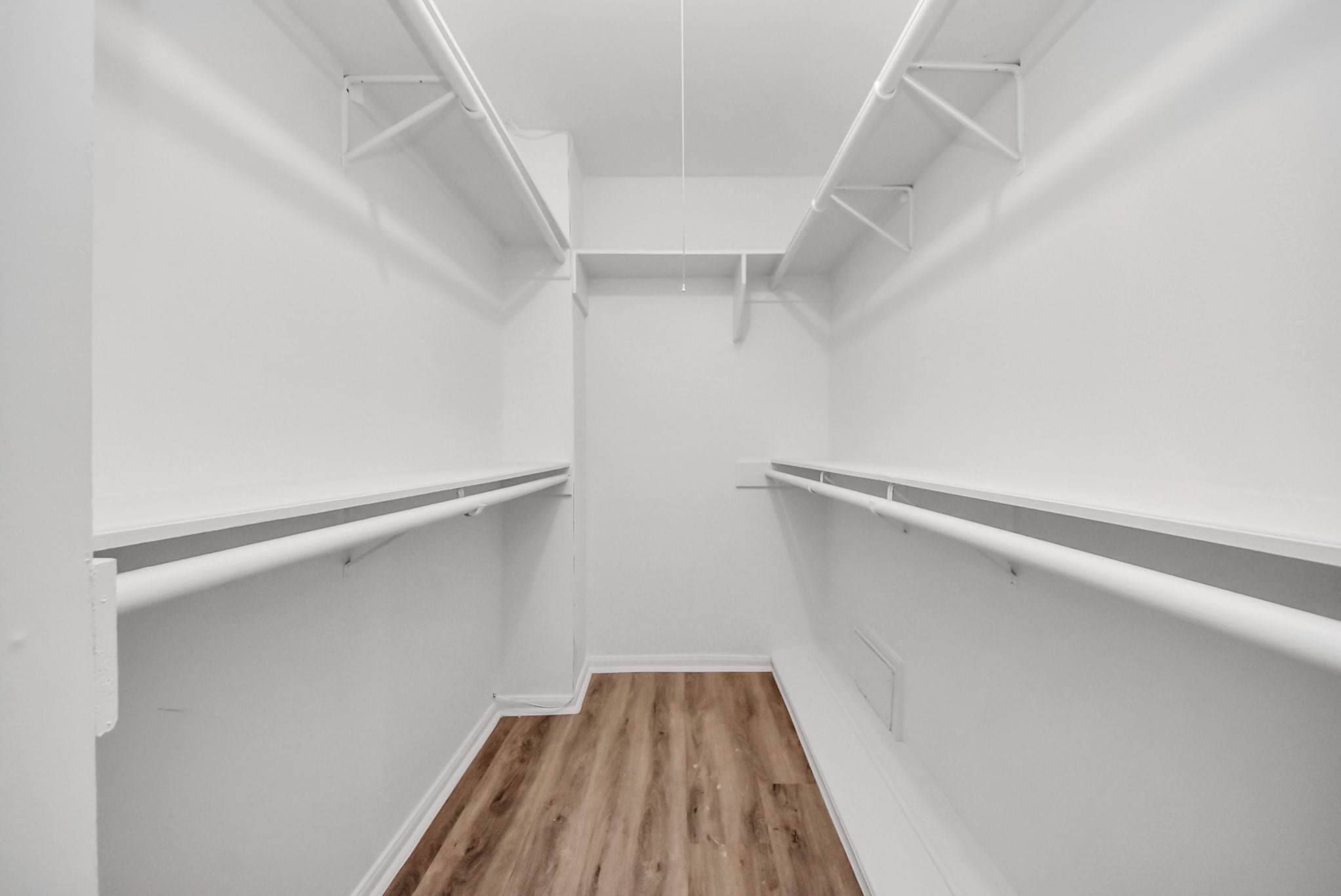 1011 Whitestone Lane Houston, TX 77073 - Photo 20 of 48 a view of walk in closet with empty racks