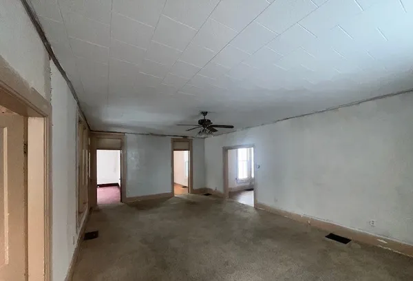 an empty room with windows