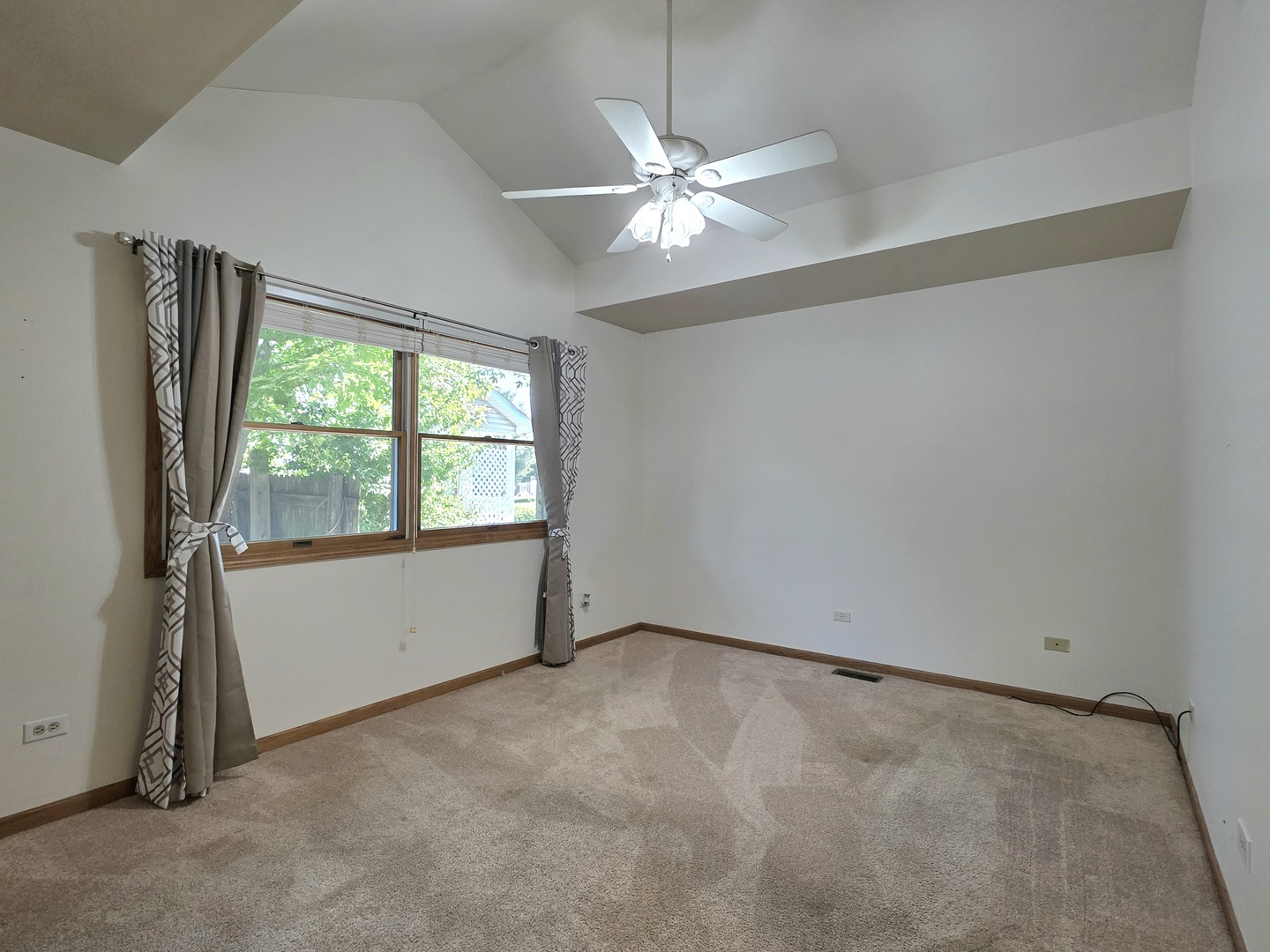 25028 Cashel Bay Road Manhattan, IL 60442 - Photo 14 of 32 an empty room with a window