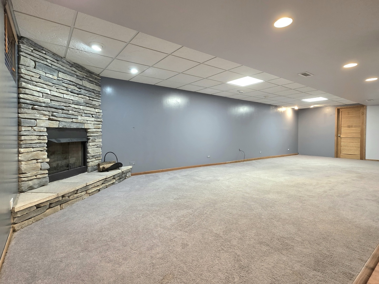 25028 Cashel Bay Road Manhattan, IL 60442 - Photo 20 of 32 a view of an empty room with a fireplace