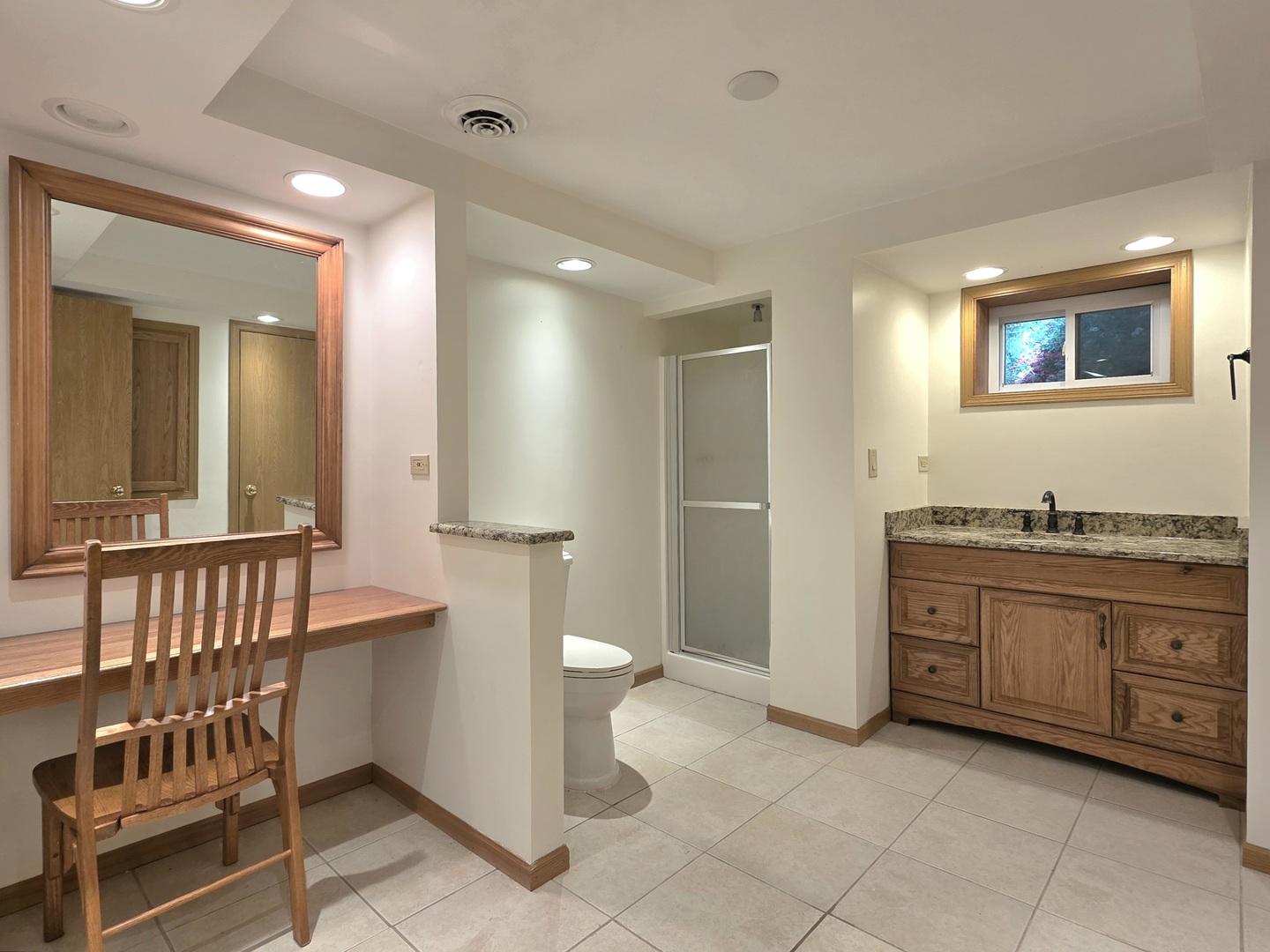 25028 Cashel Bay Road Manhattan, IL 60442 - Photo 23 of 32 a spacious bathroom with a granite countertop sink a mirror and a bathtub