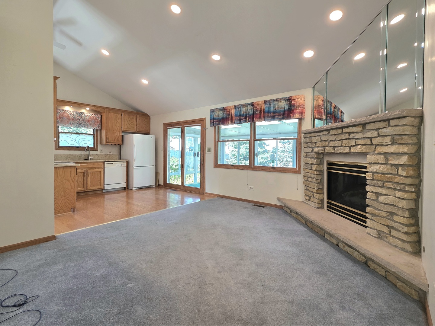 25028 Cashel Bay Road Manhattan, IL 60442 - Photo 9 of 32 an empty room with windows and fireplace