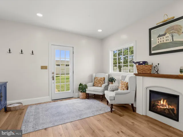 a bedroom with bed and a chandelier