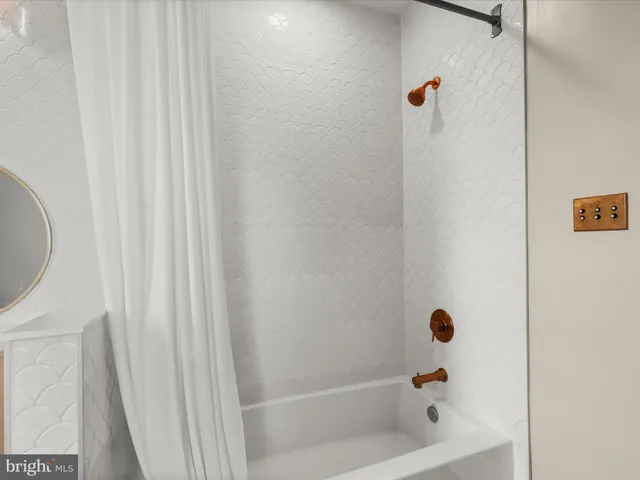 a view of a patio with a table chairs and a table